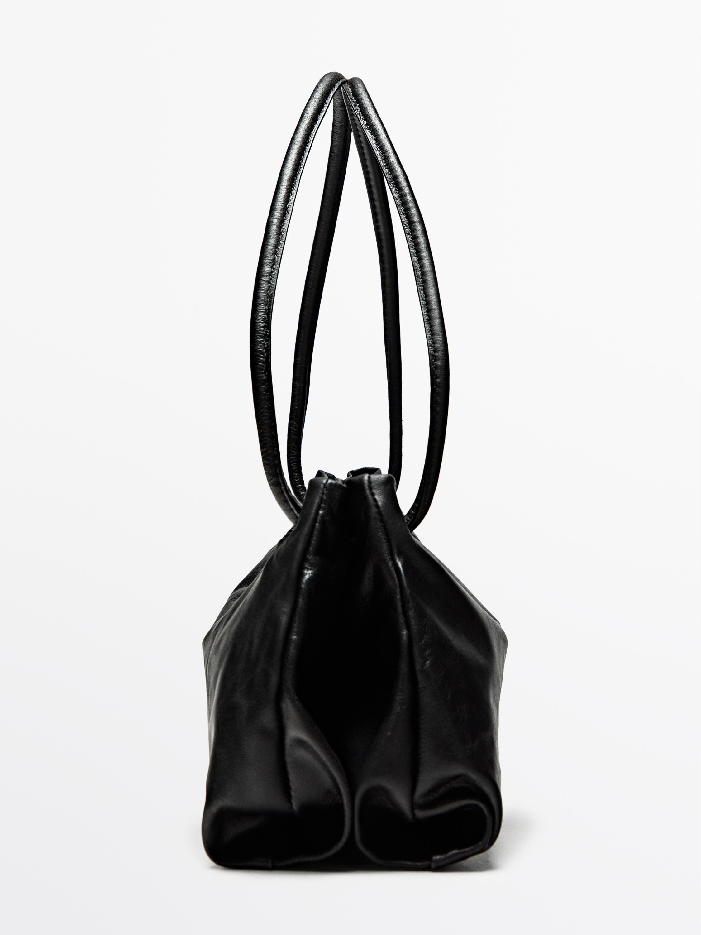 Small nappa leather bag with compartments