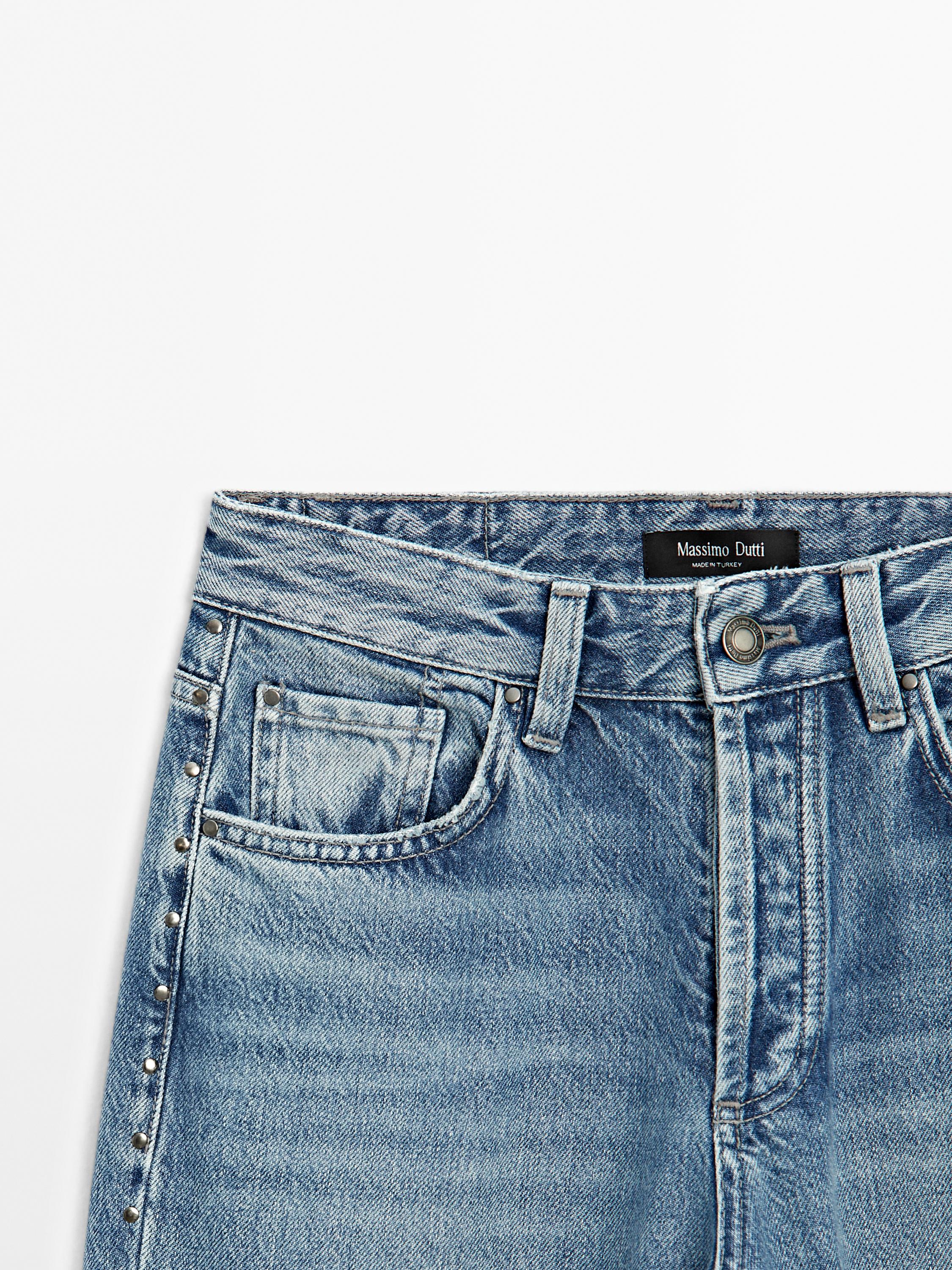 Farmerke srednje visokog struka i širokih wide leg nogavica sa nitnama