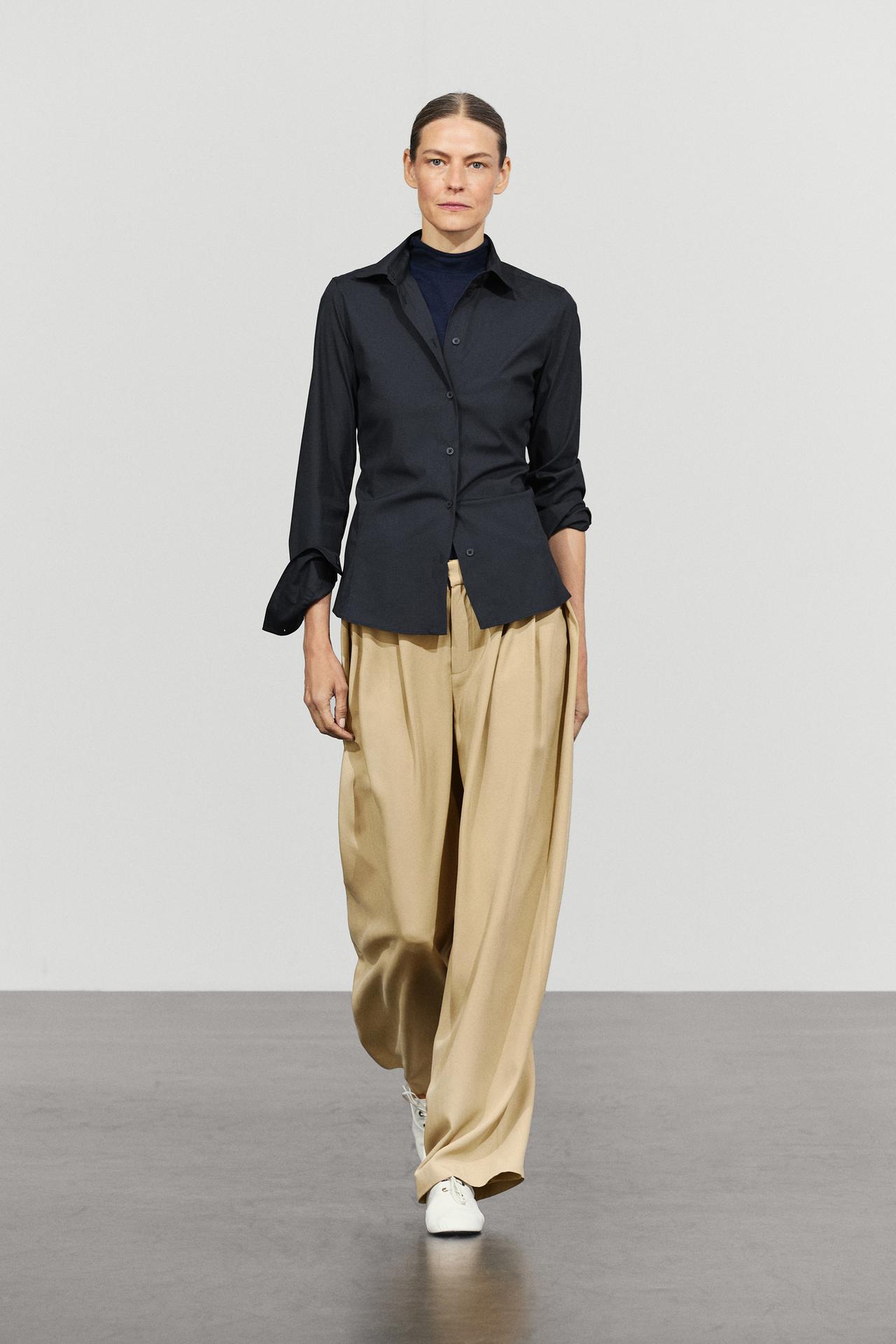 Flowing pleated pants with button detail — BEIGE