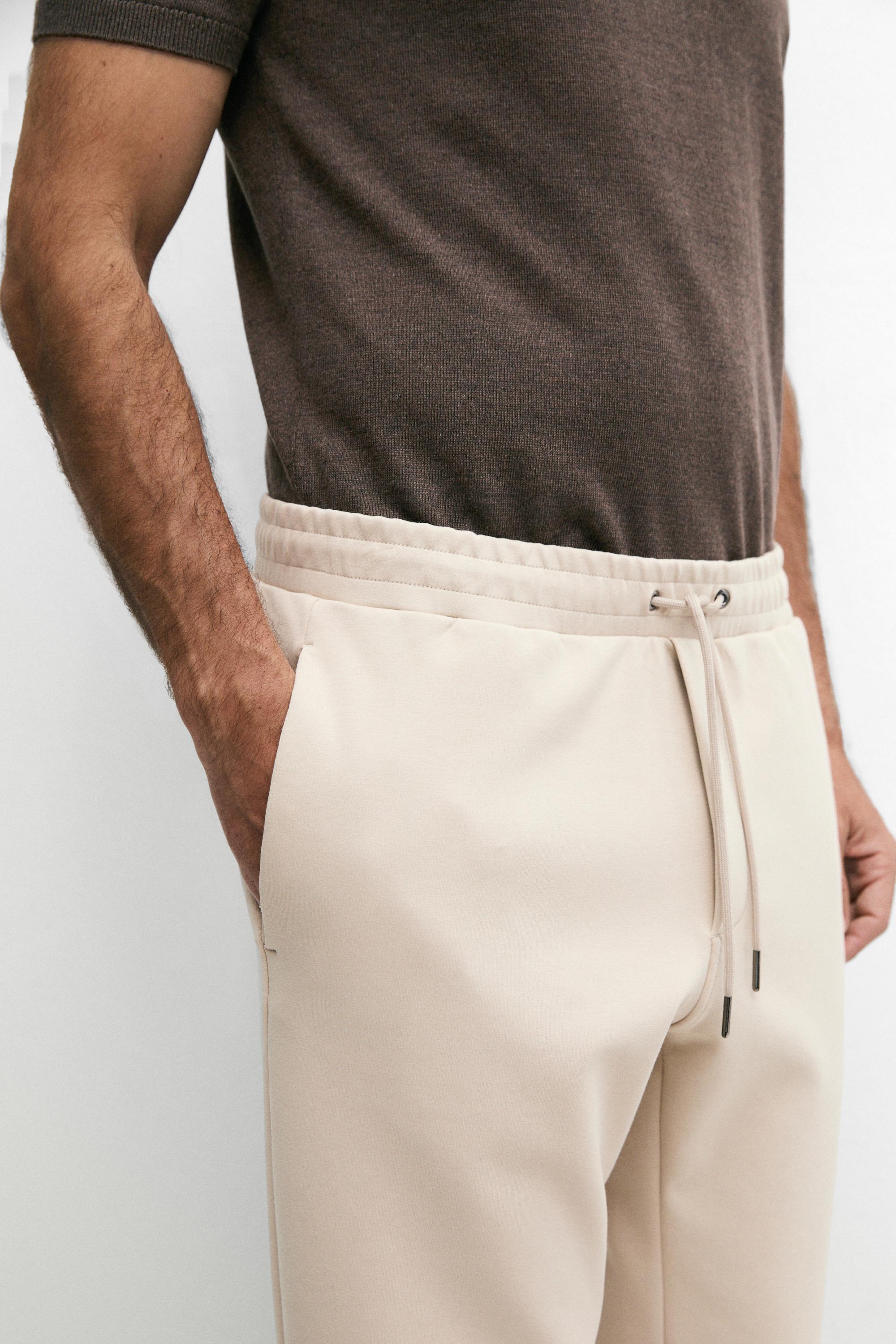 Total look cotton blend jogger fit trousers — Light Beige