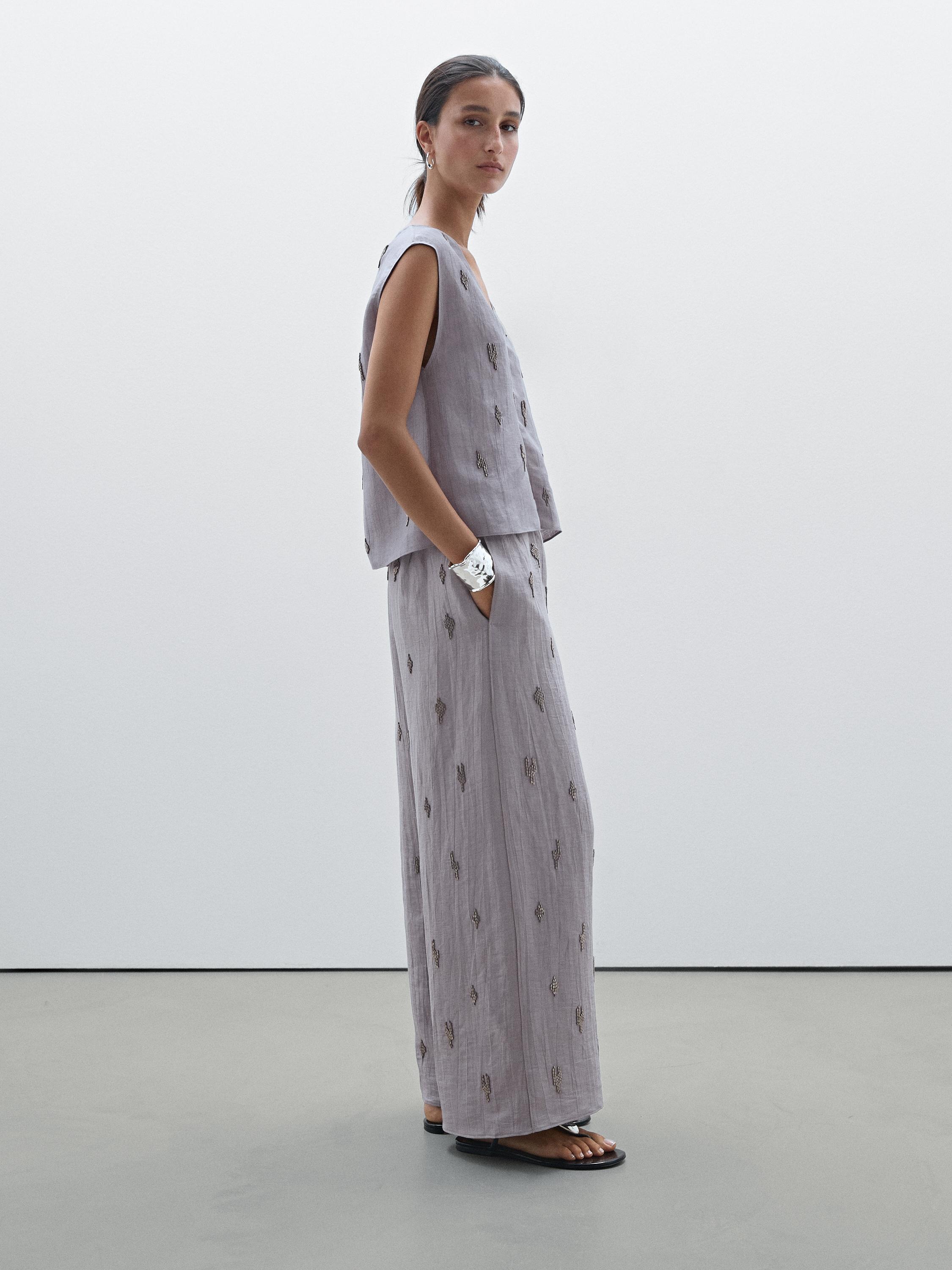 سروال من مزيج كتان بتفصيل حجر الراين