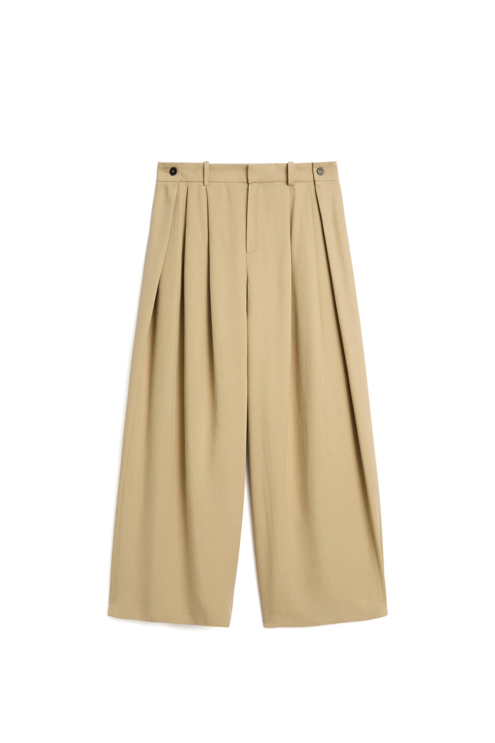 Flowing pleated pants with button detail — BEIGE