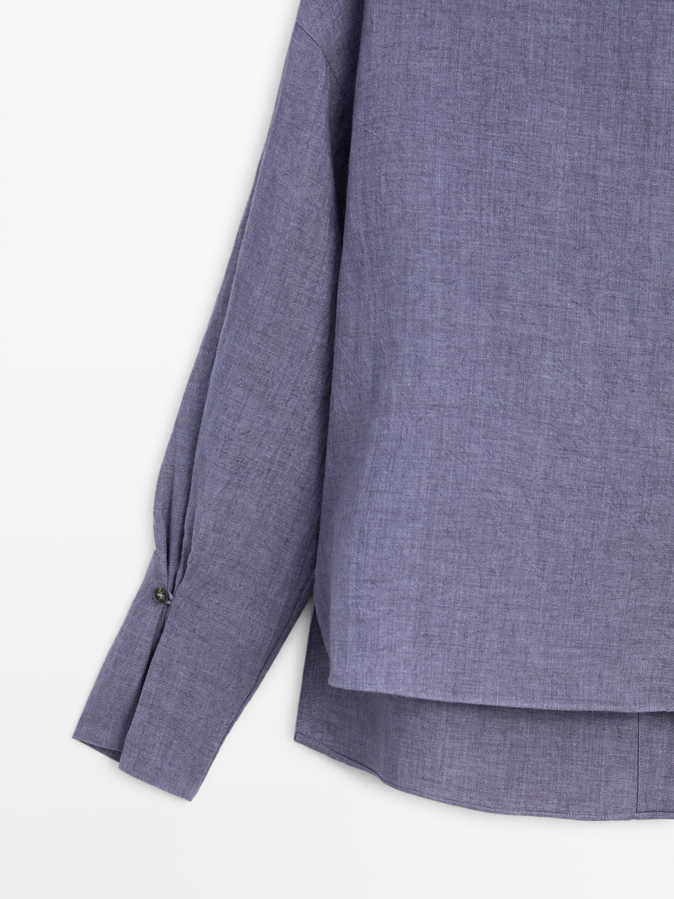 Blusa escote pico detalle manga