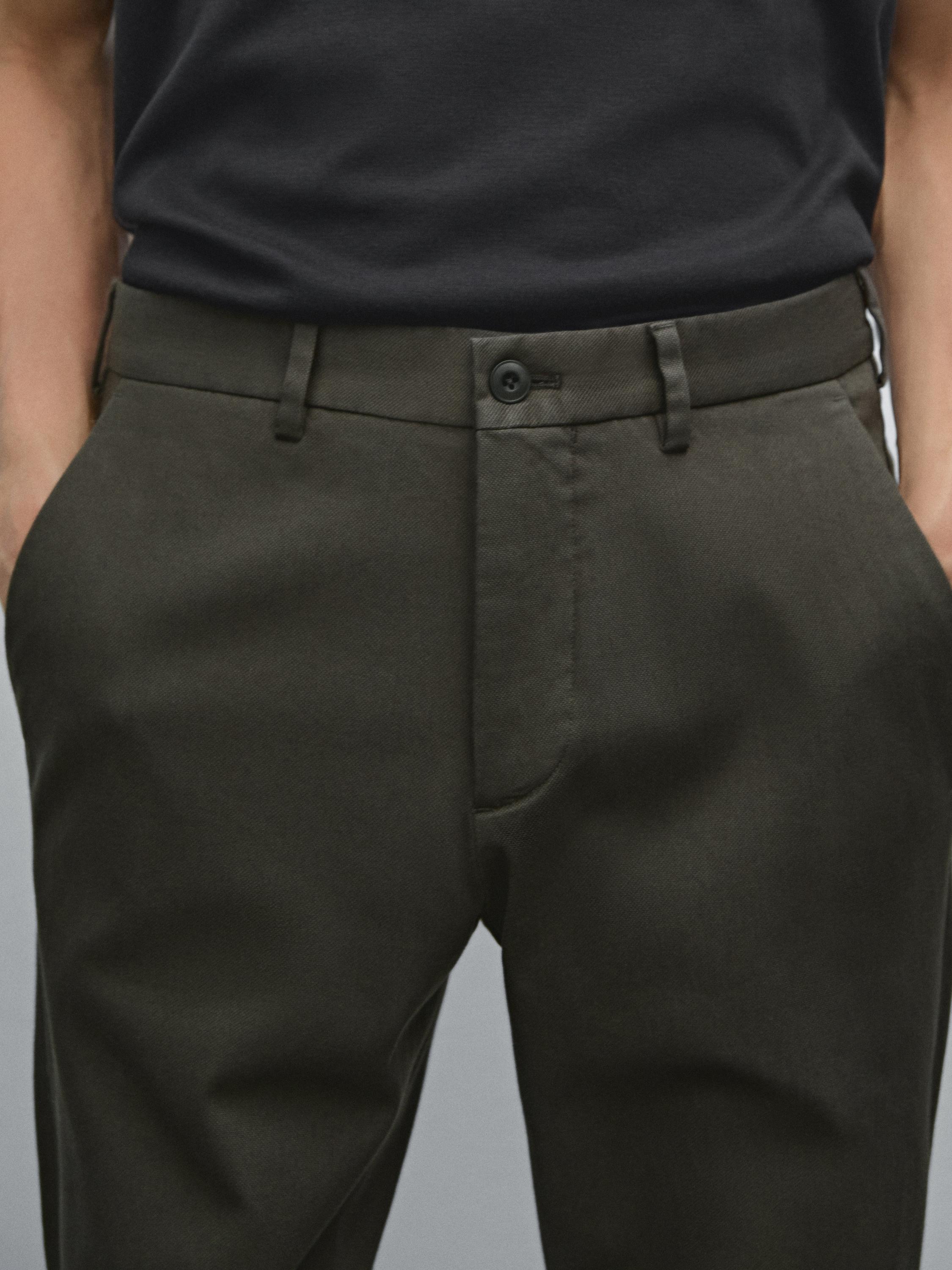 Quần dài dáng slim fit cấu trúc pha cốt-tông