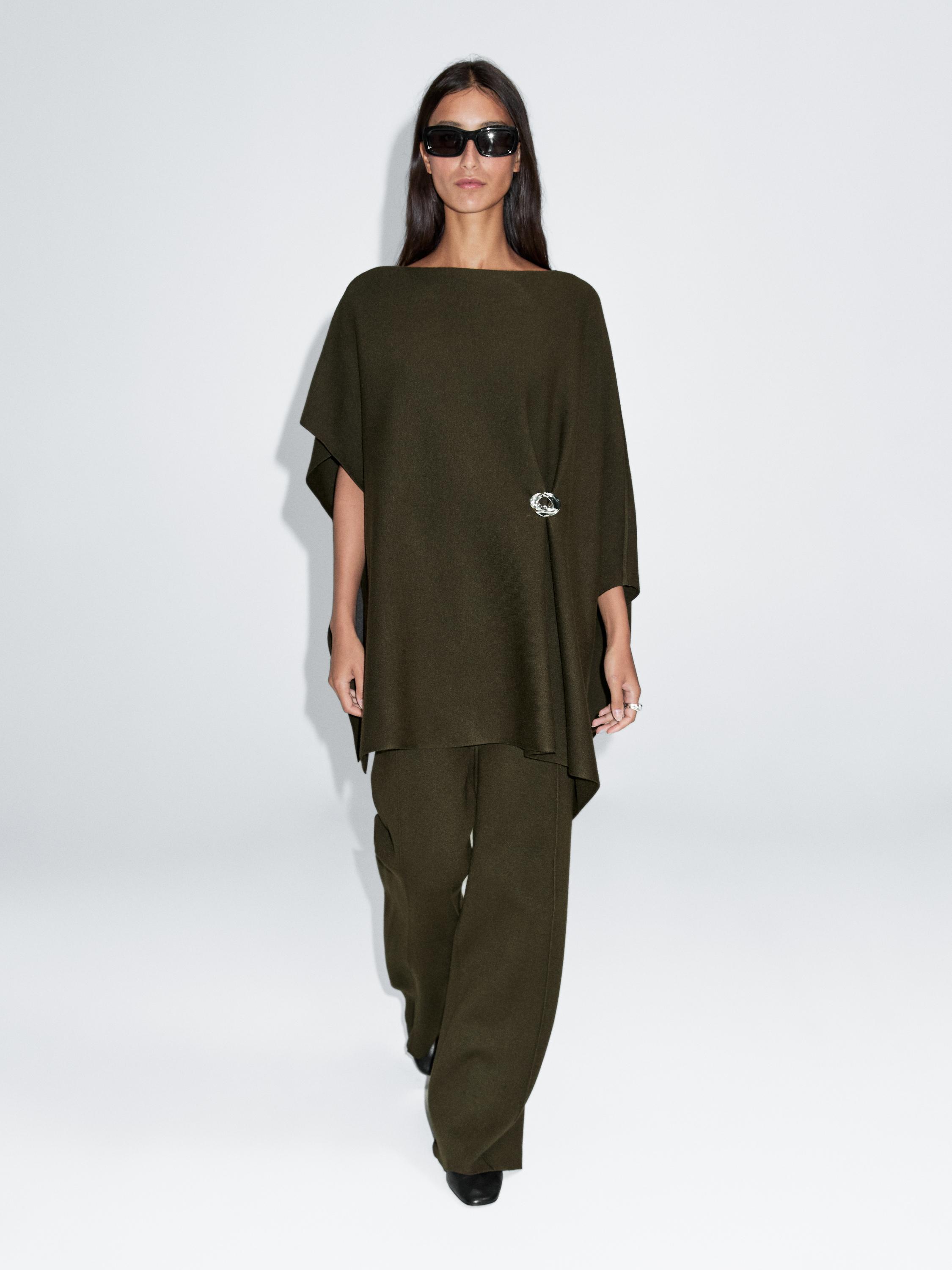 Capa punto detalle broche