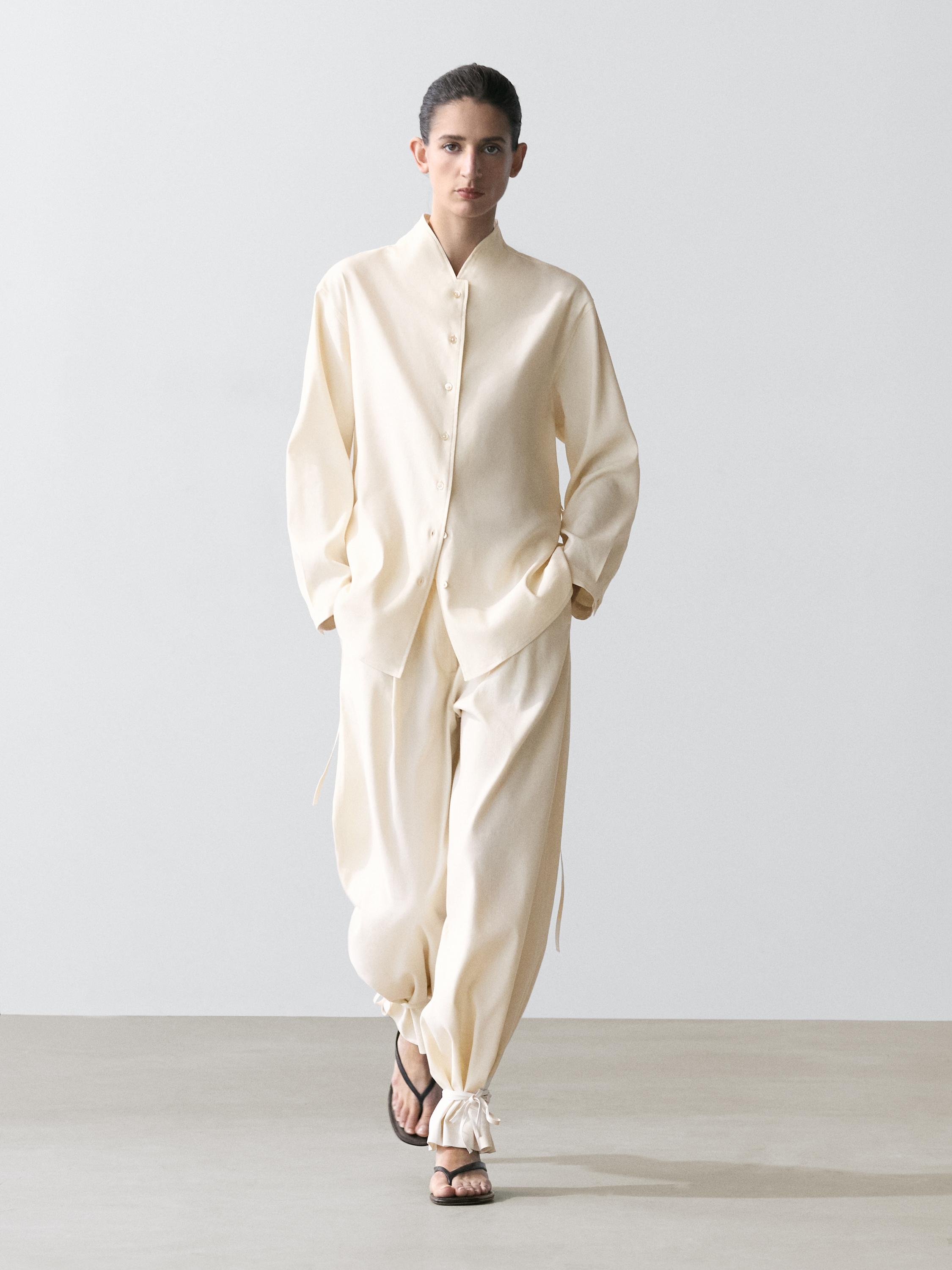 Flowing barrel fit trousers — CREAM