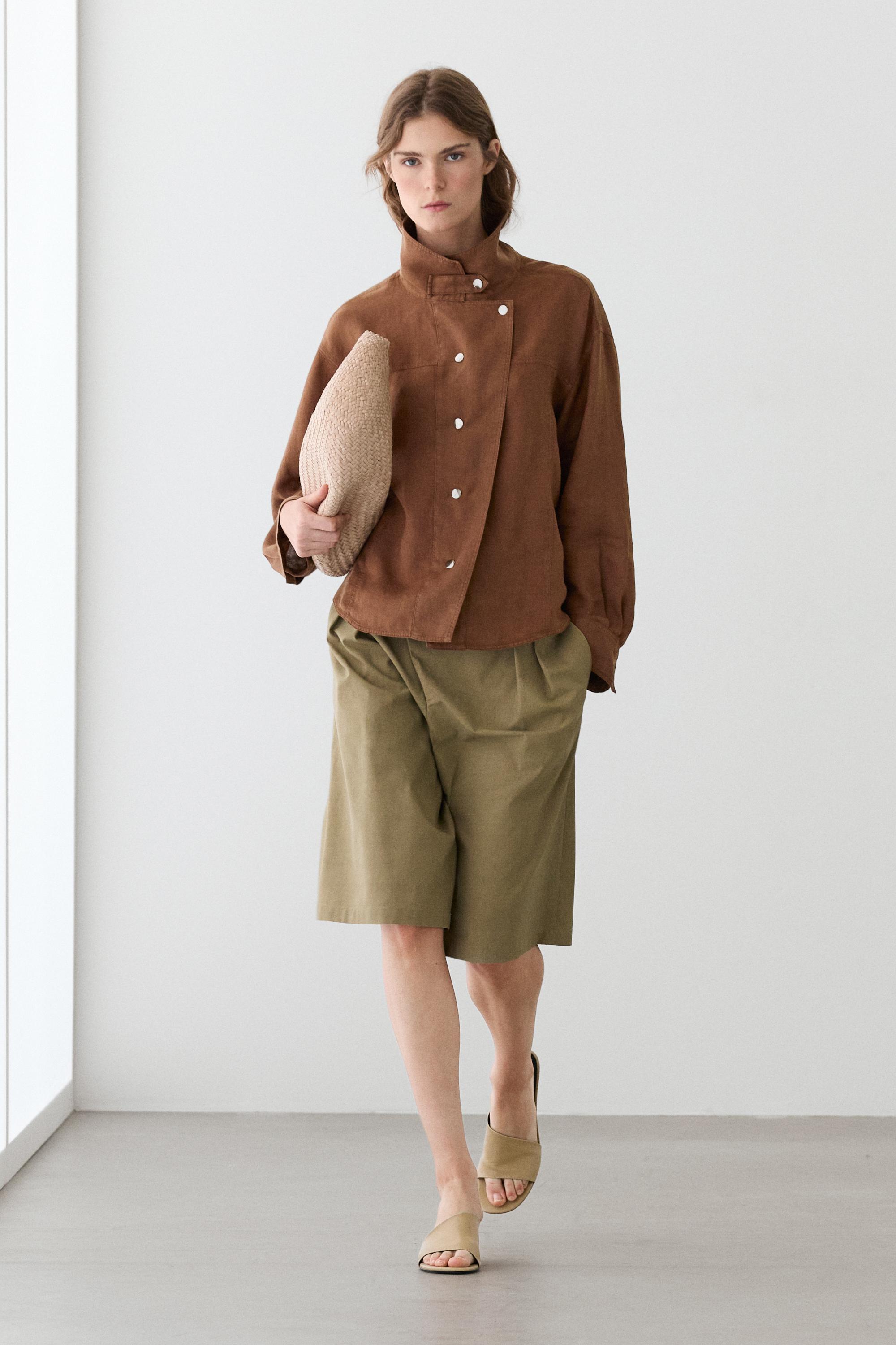 Braided leather half-moon bag — CREAM