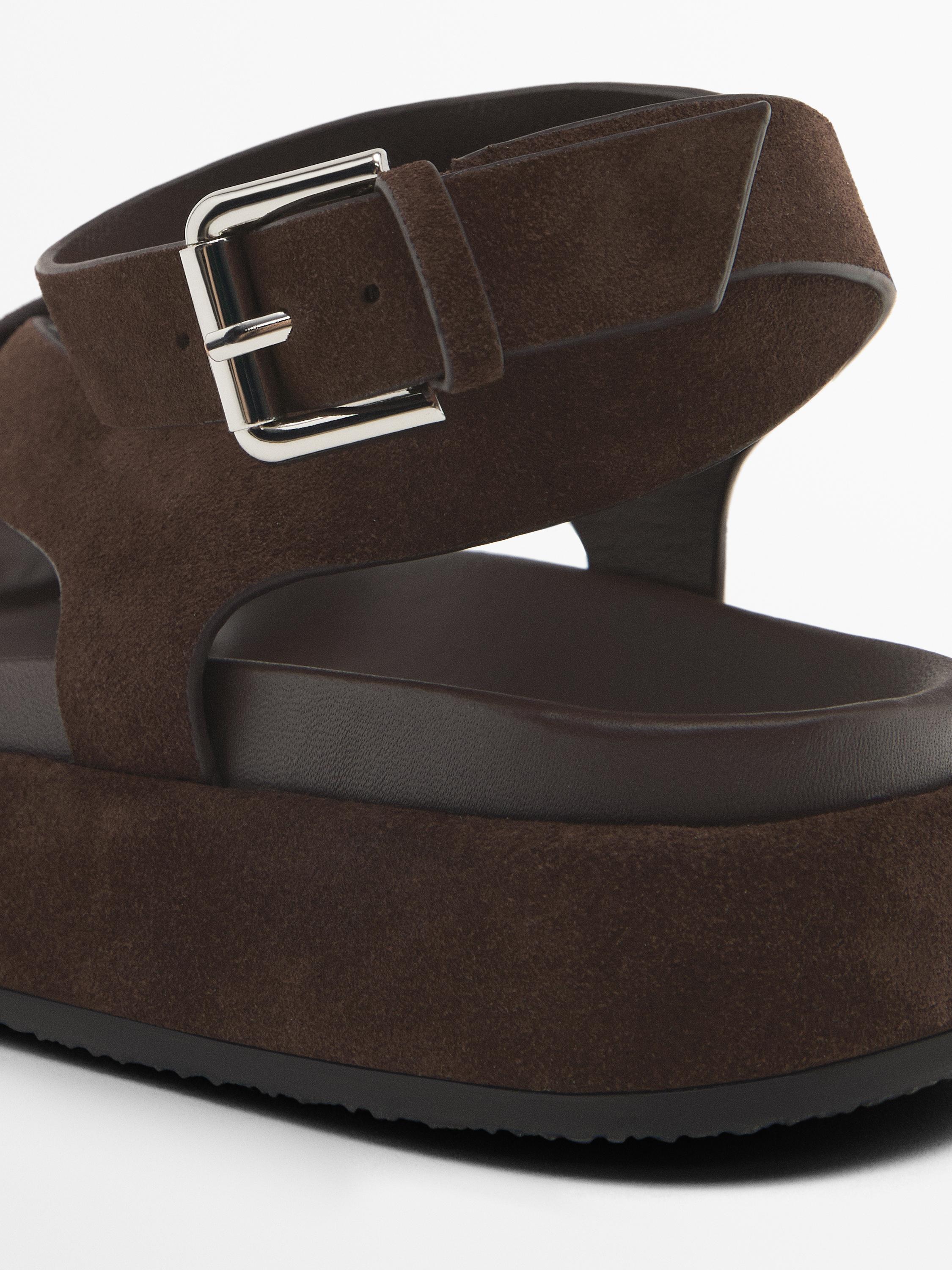 Sandals with crossover straps
