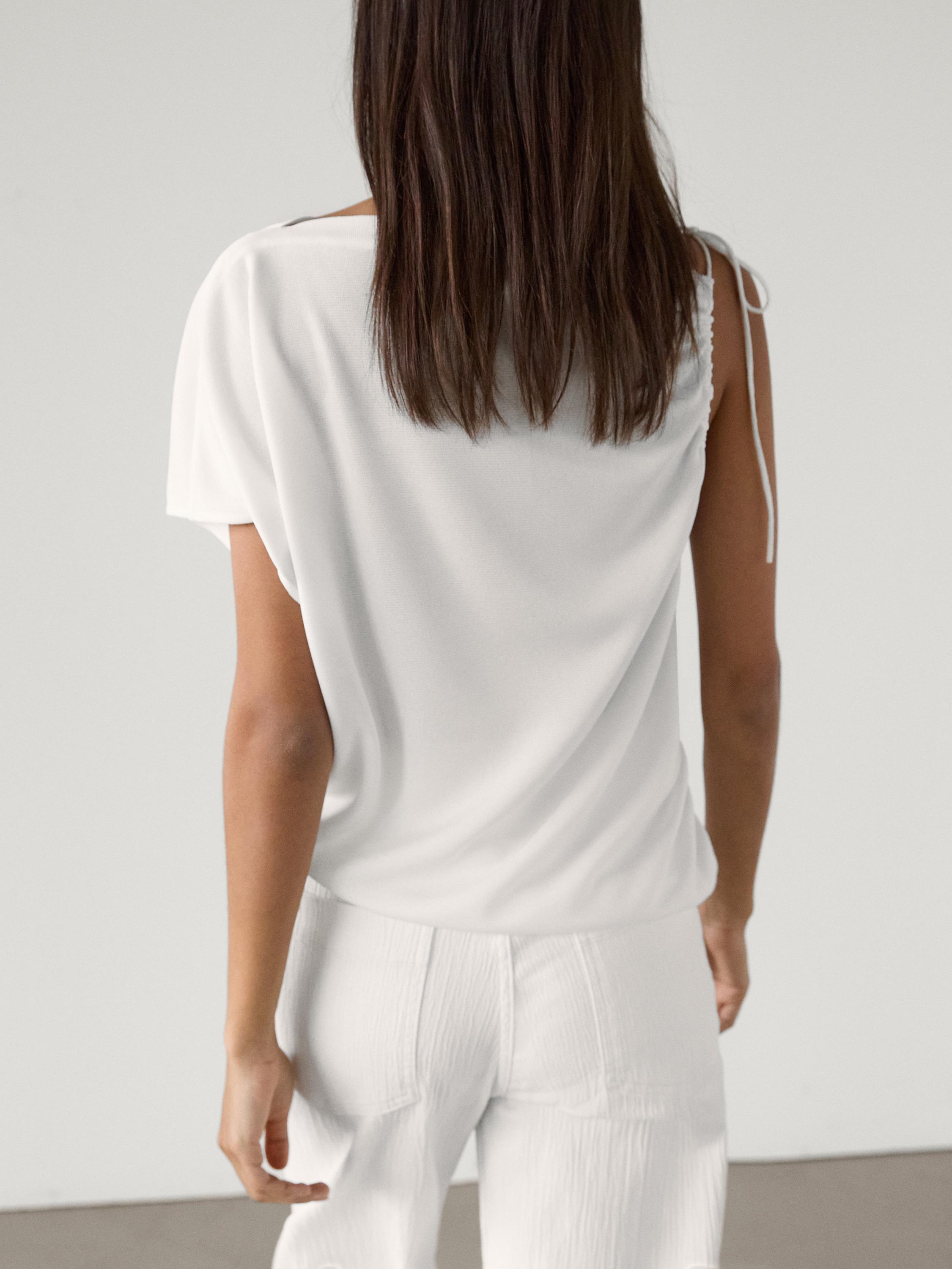 Draped top with asymmetric neckline