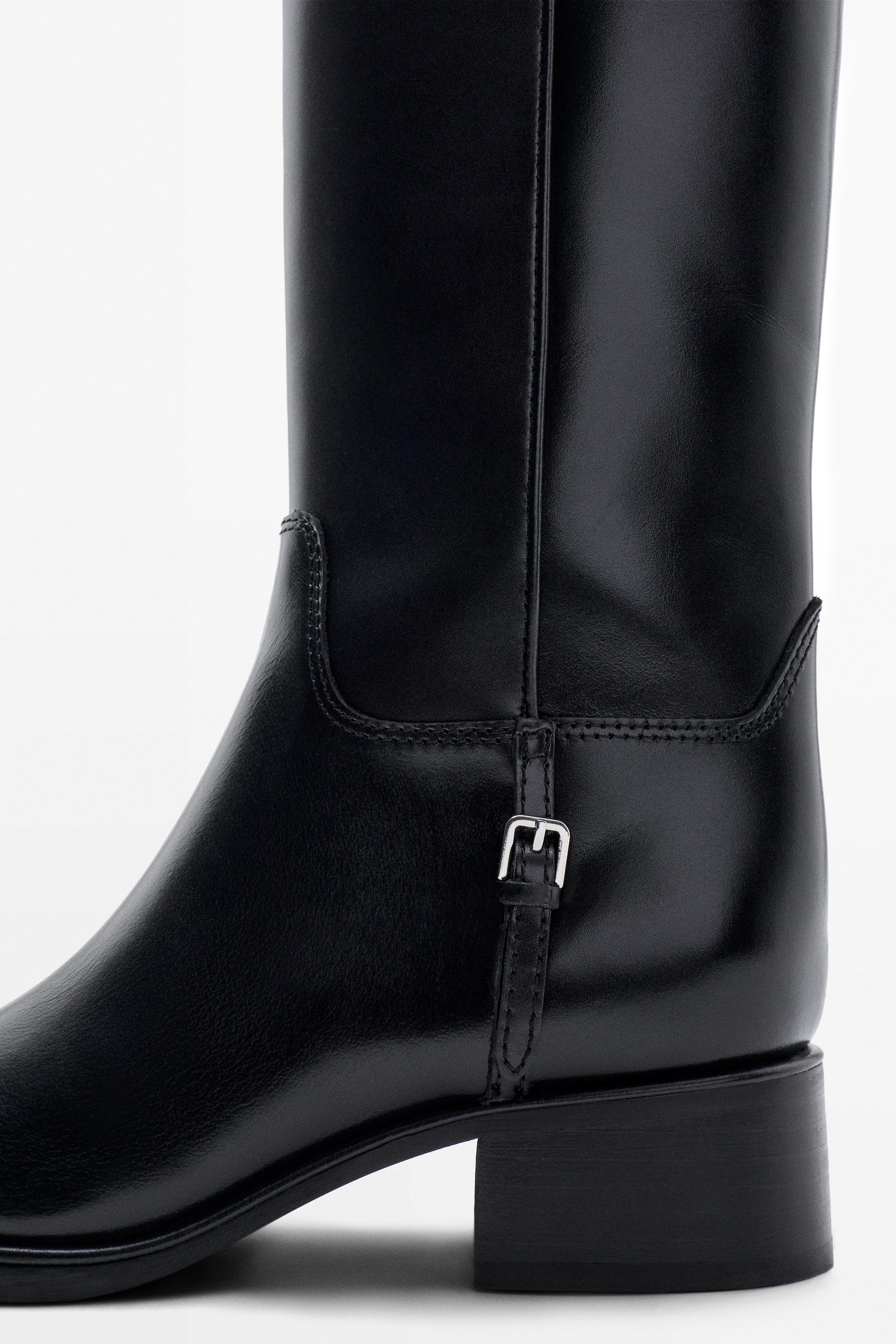 Flat leather boots with lateral buckle — BLACK