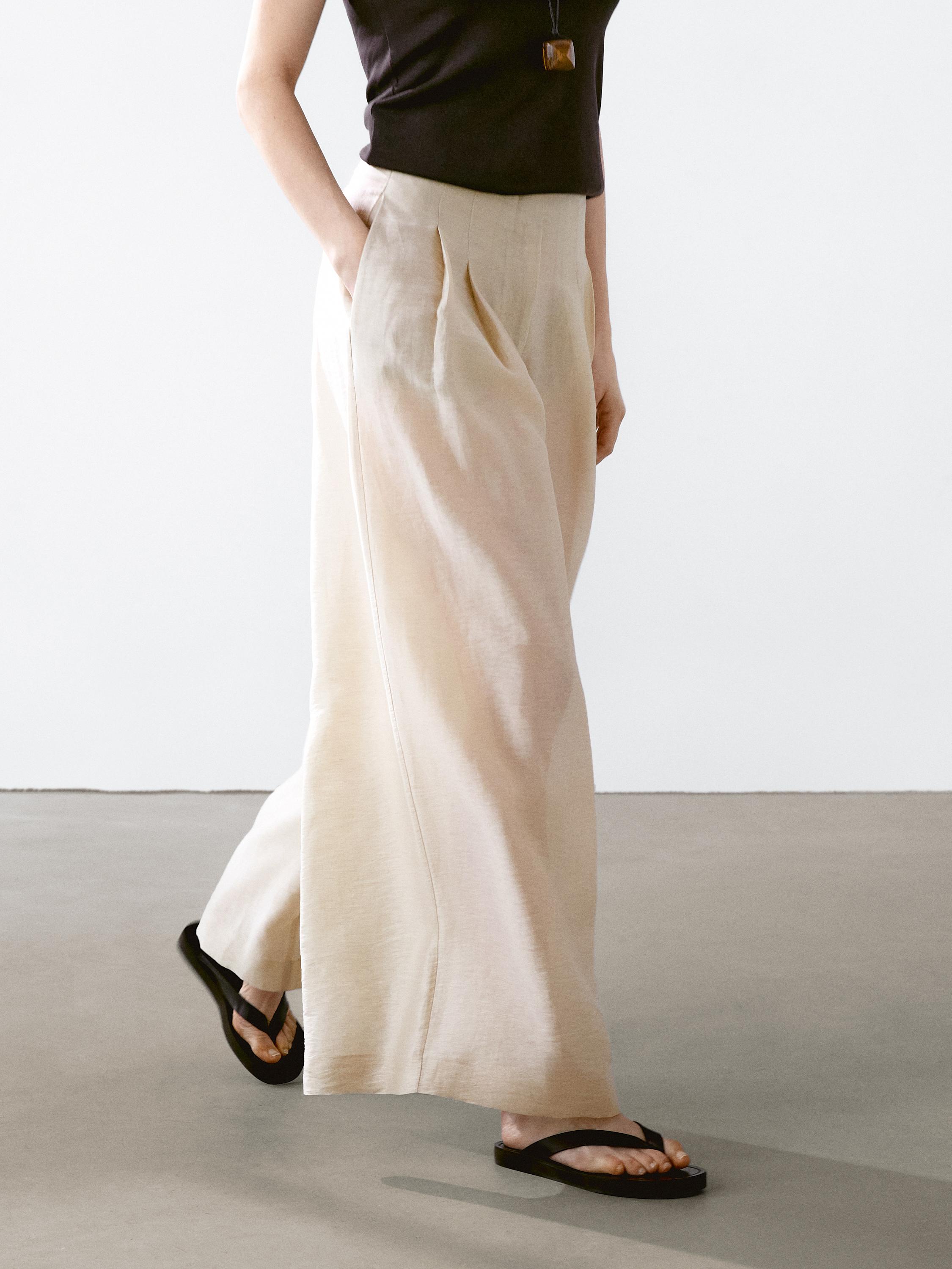 Splývavé nohavice z ľanovej zmesi so záševkami