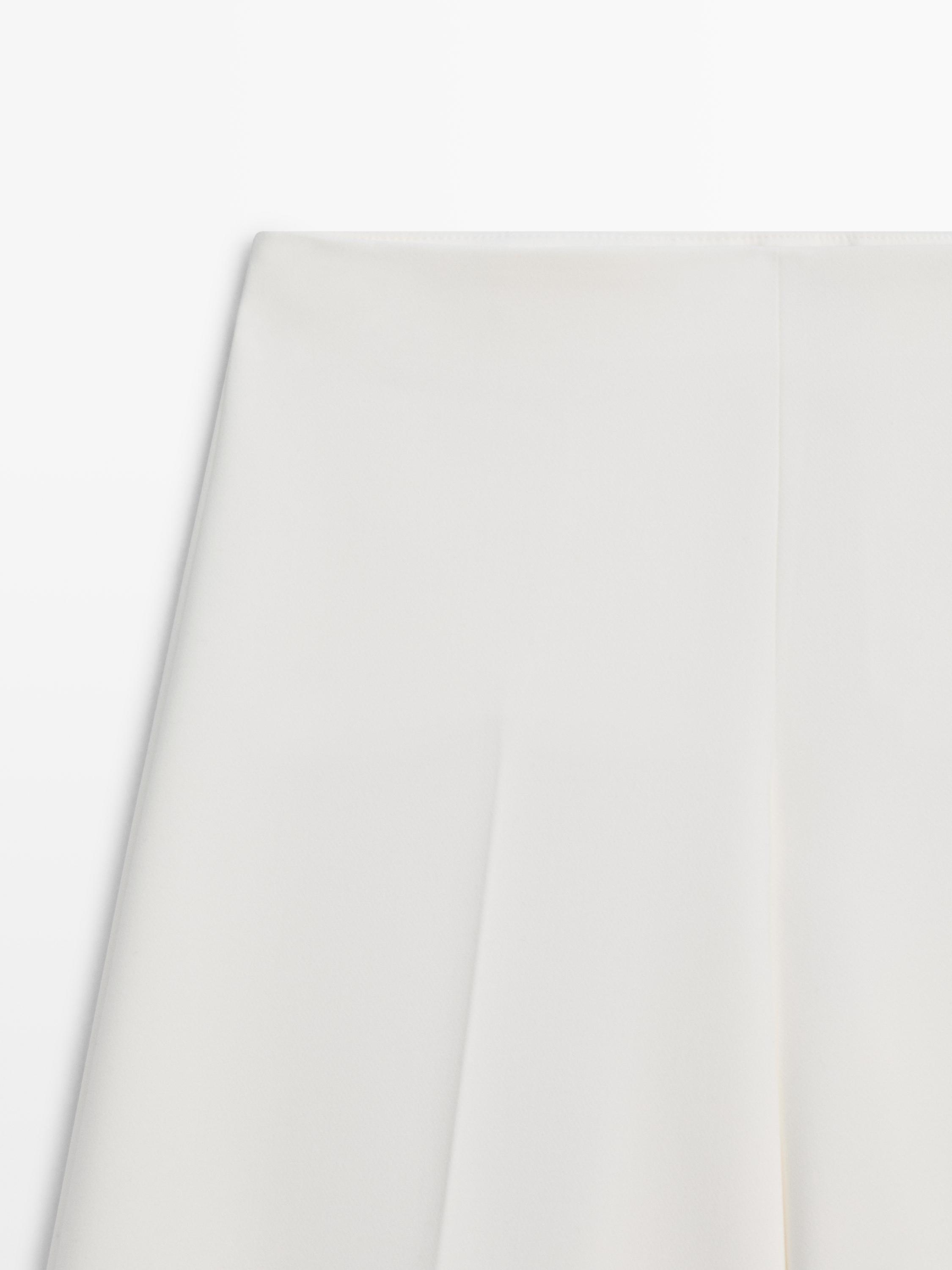 Wide-leg voluminous trousers — CREAM