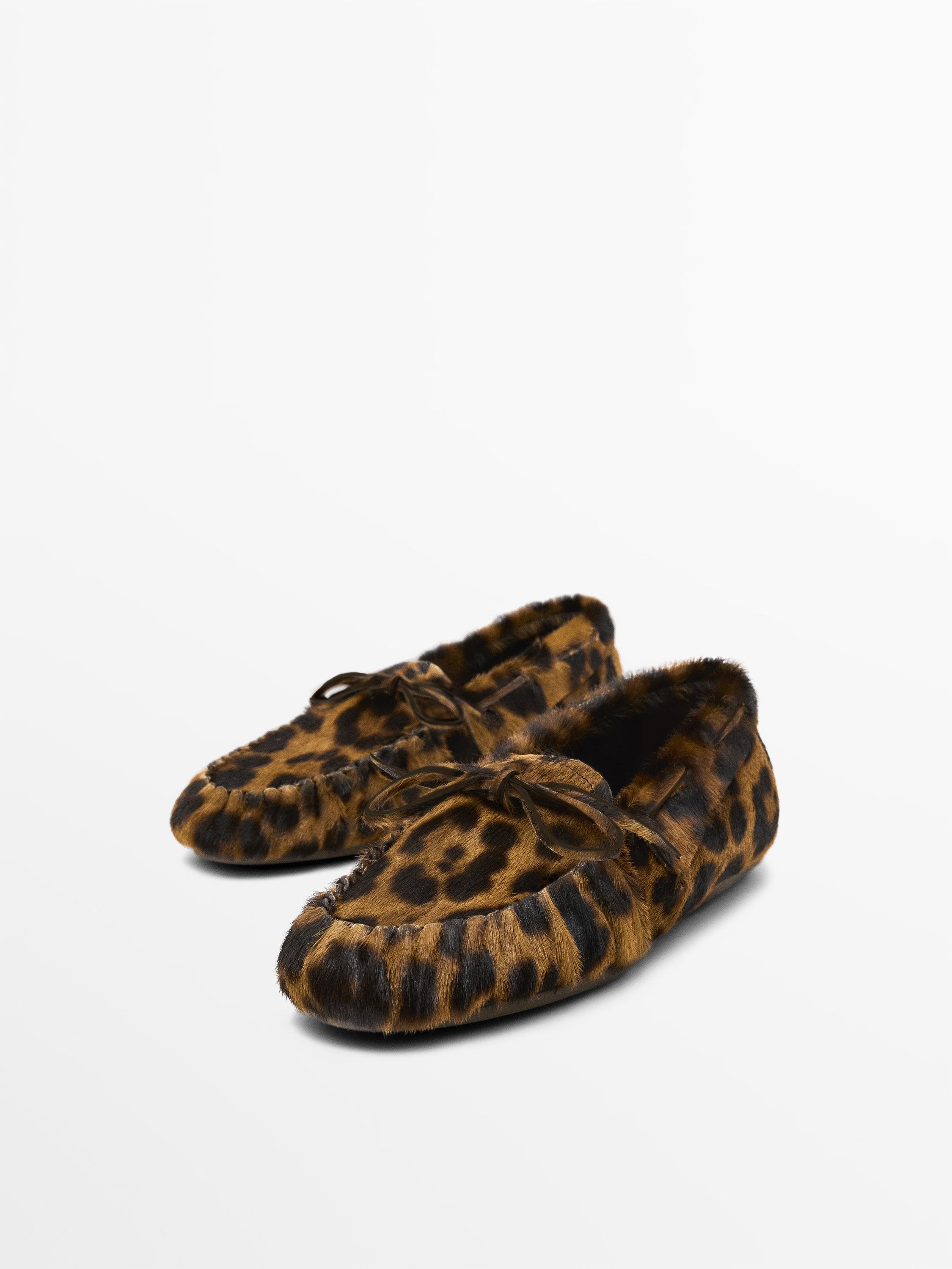 Animal print deck shoes