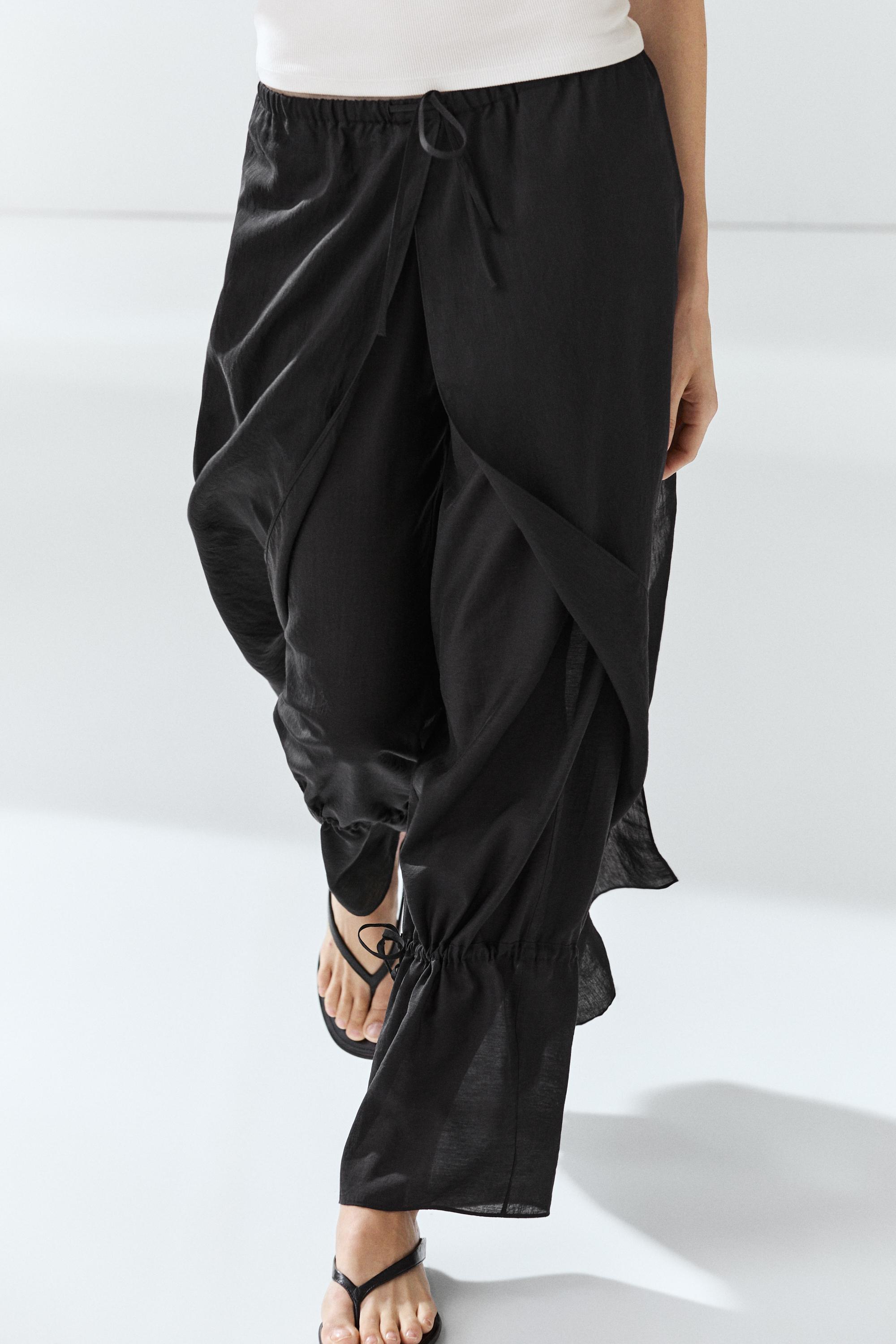 Double-layer pants with tie detail — BLACK