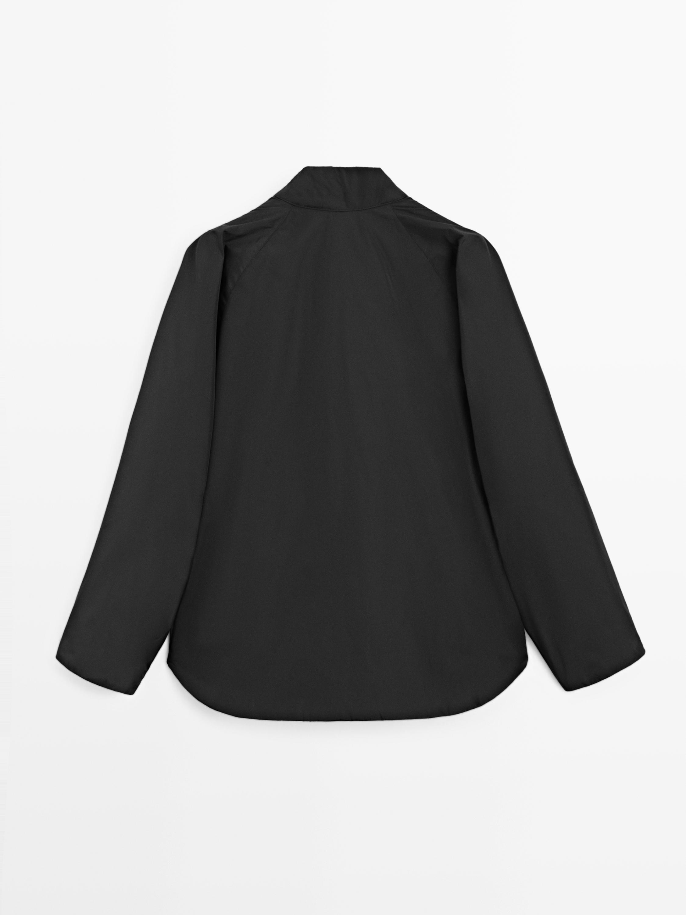 Parka courte matelassée détail col