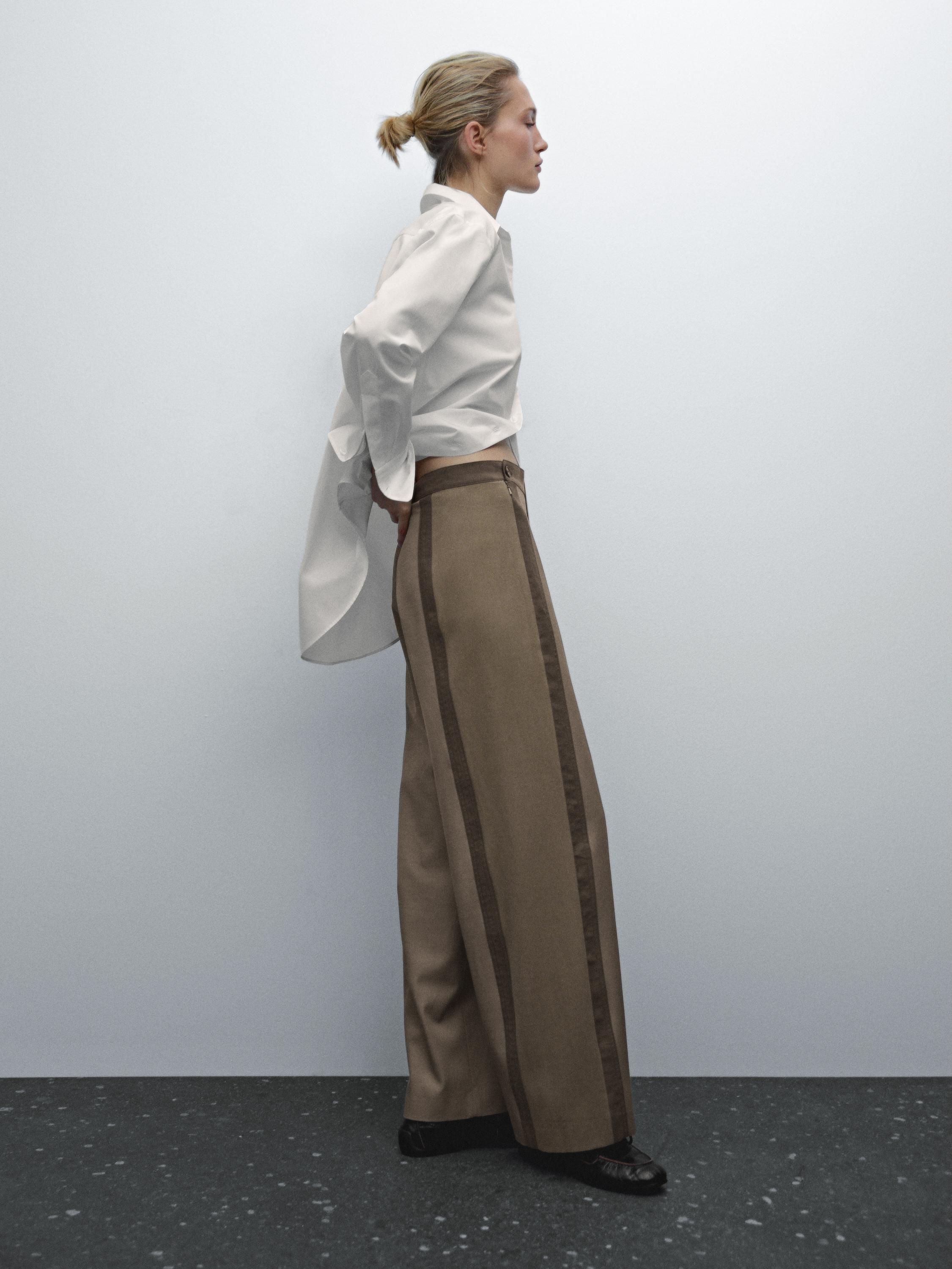 Straight-leg trousers with fastening detail