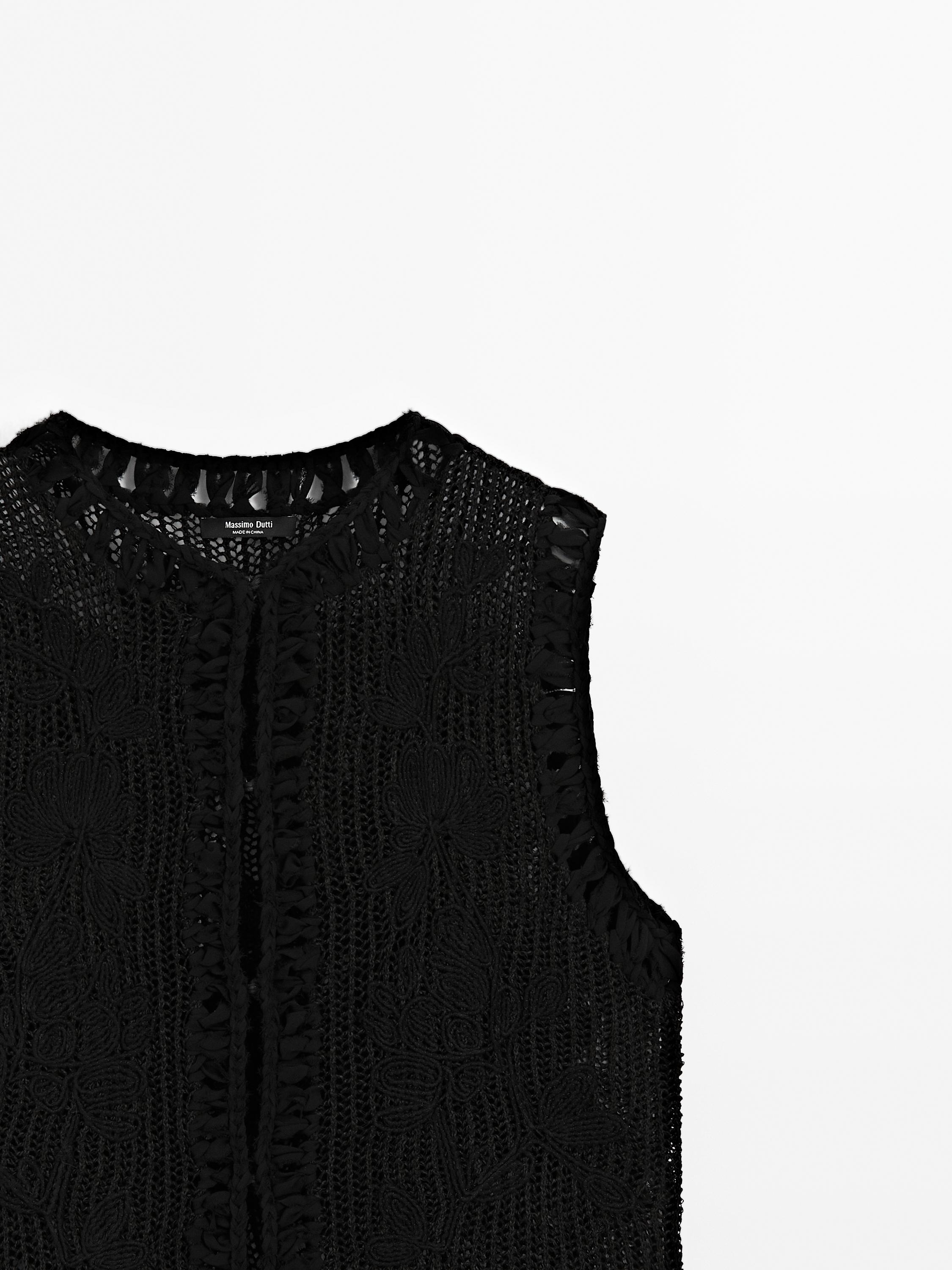Knit vest with embroidered detail