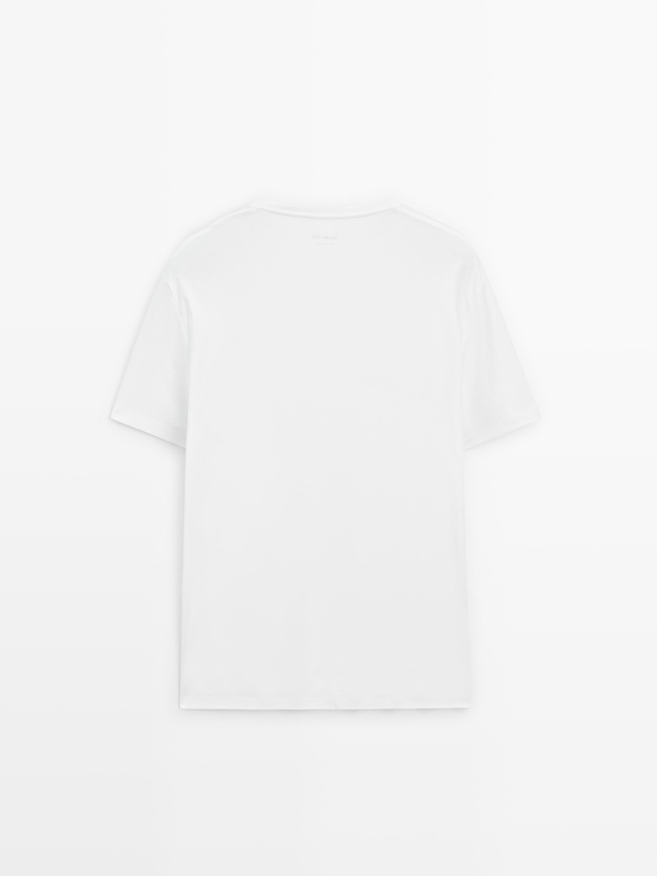 Short sleeve pyjama top and striped trousers