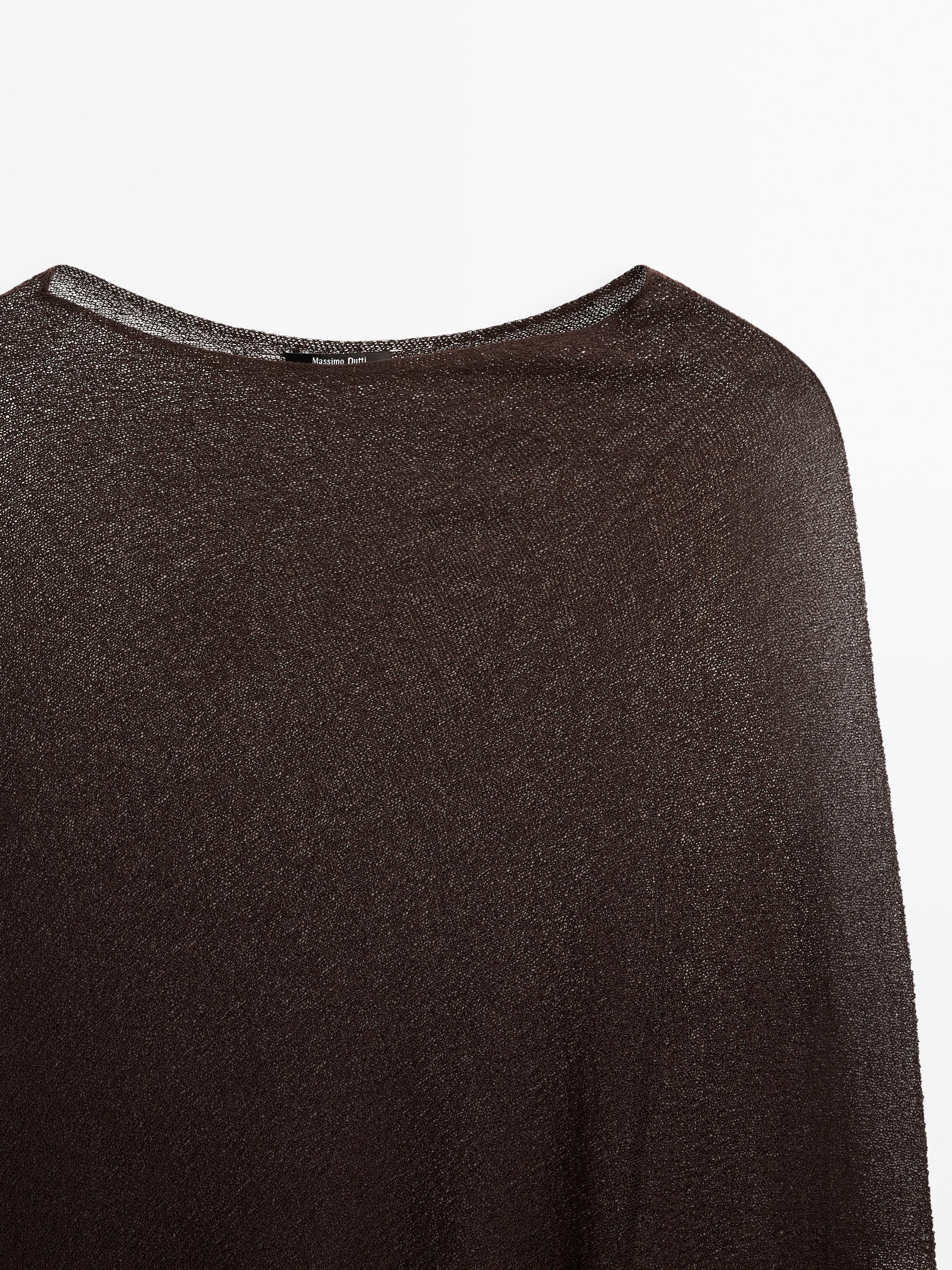 Asymmetric knit cape
