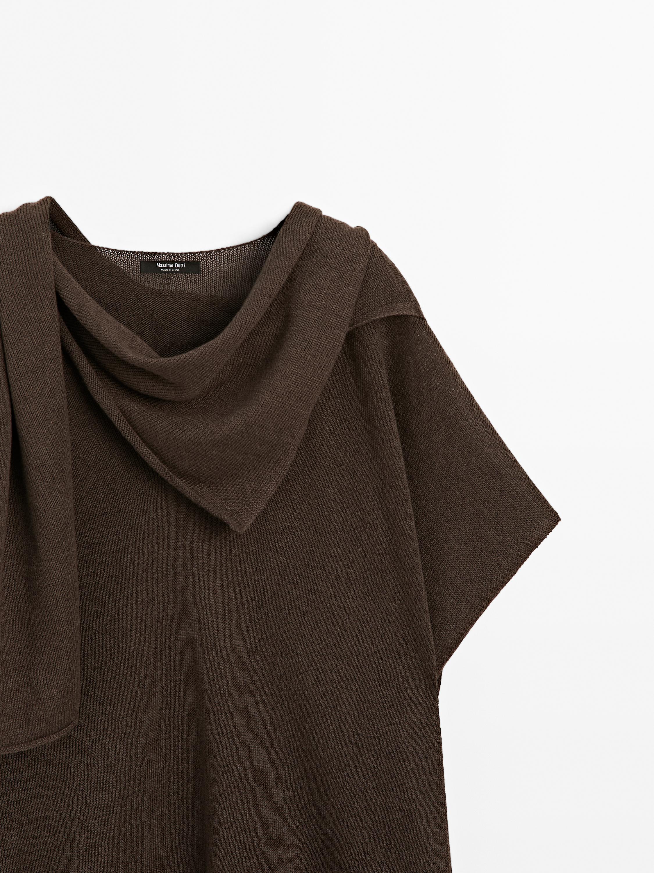 Knit cape with scarf