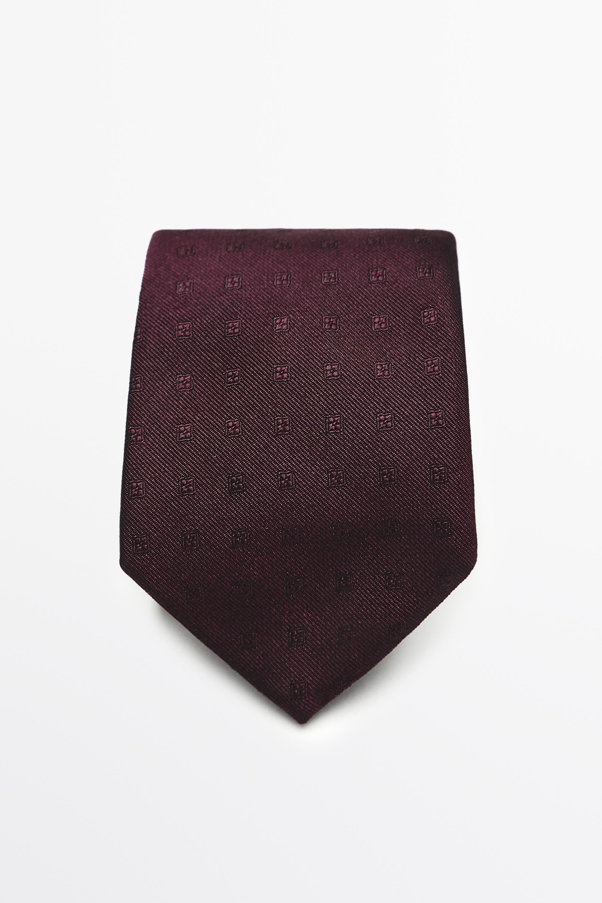 100% silk tie with embroidered detail