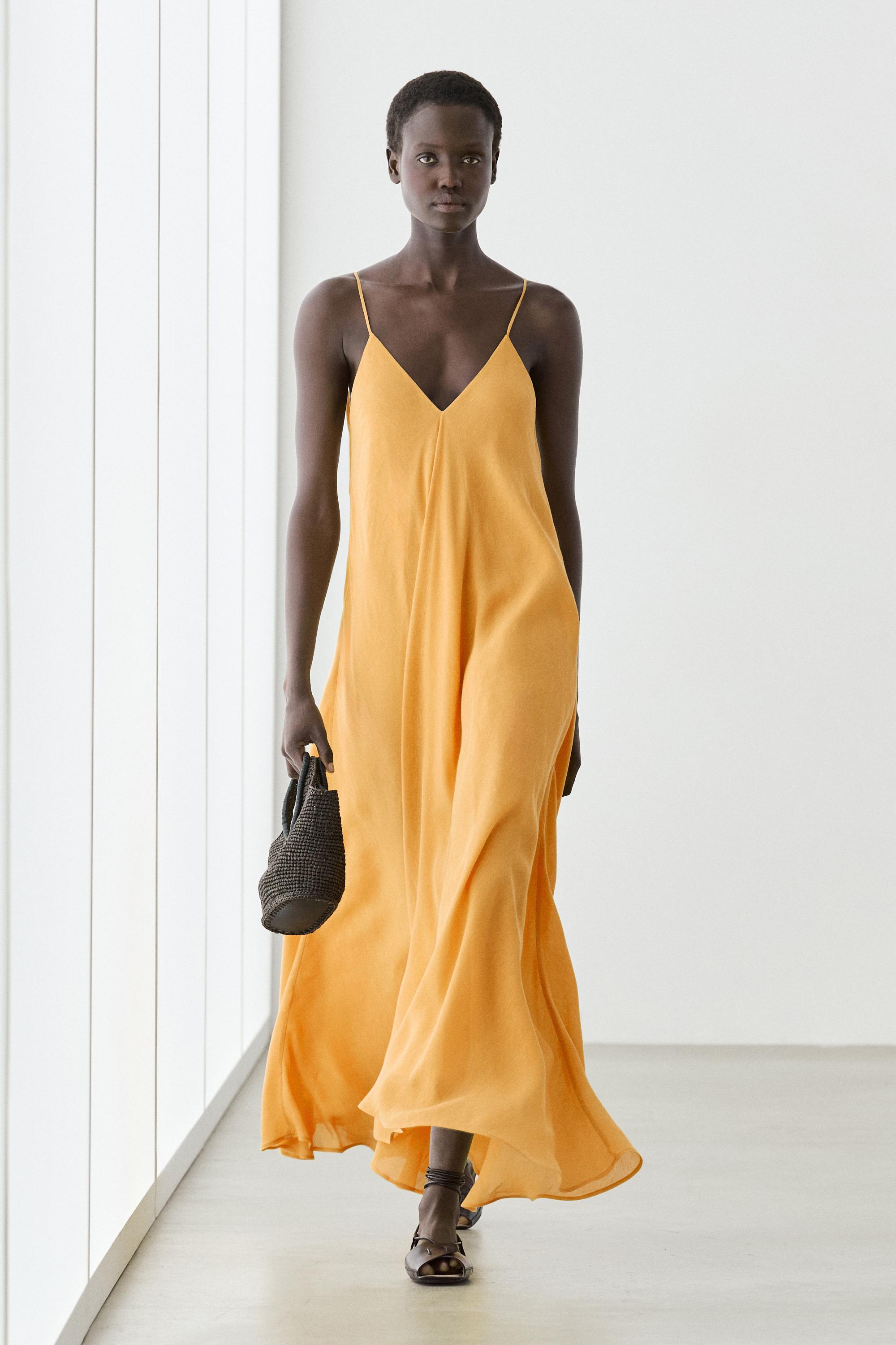 Fließendes Leinenkleid mit V-Ausschnitt