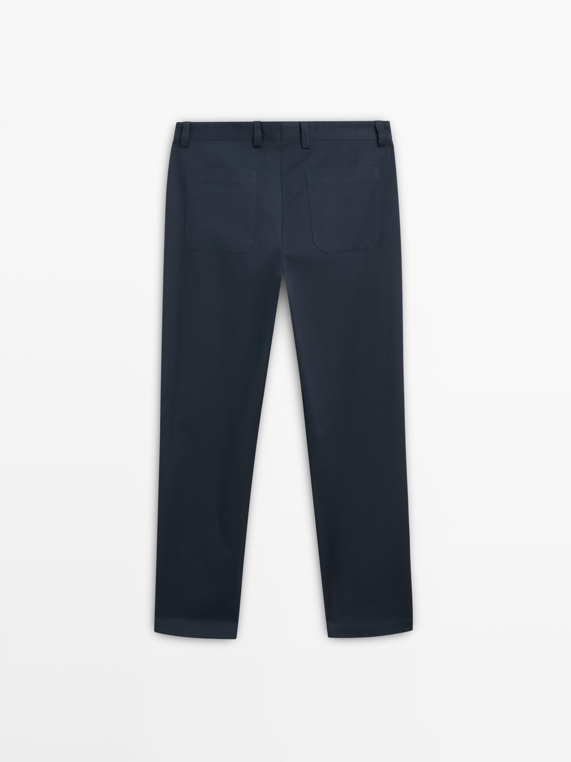 Slim fit cotton blend trousers.