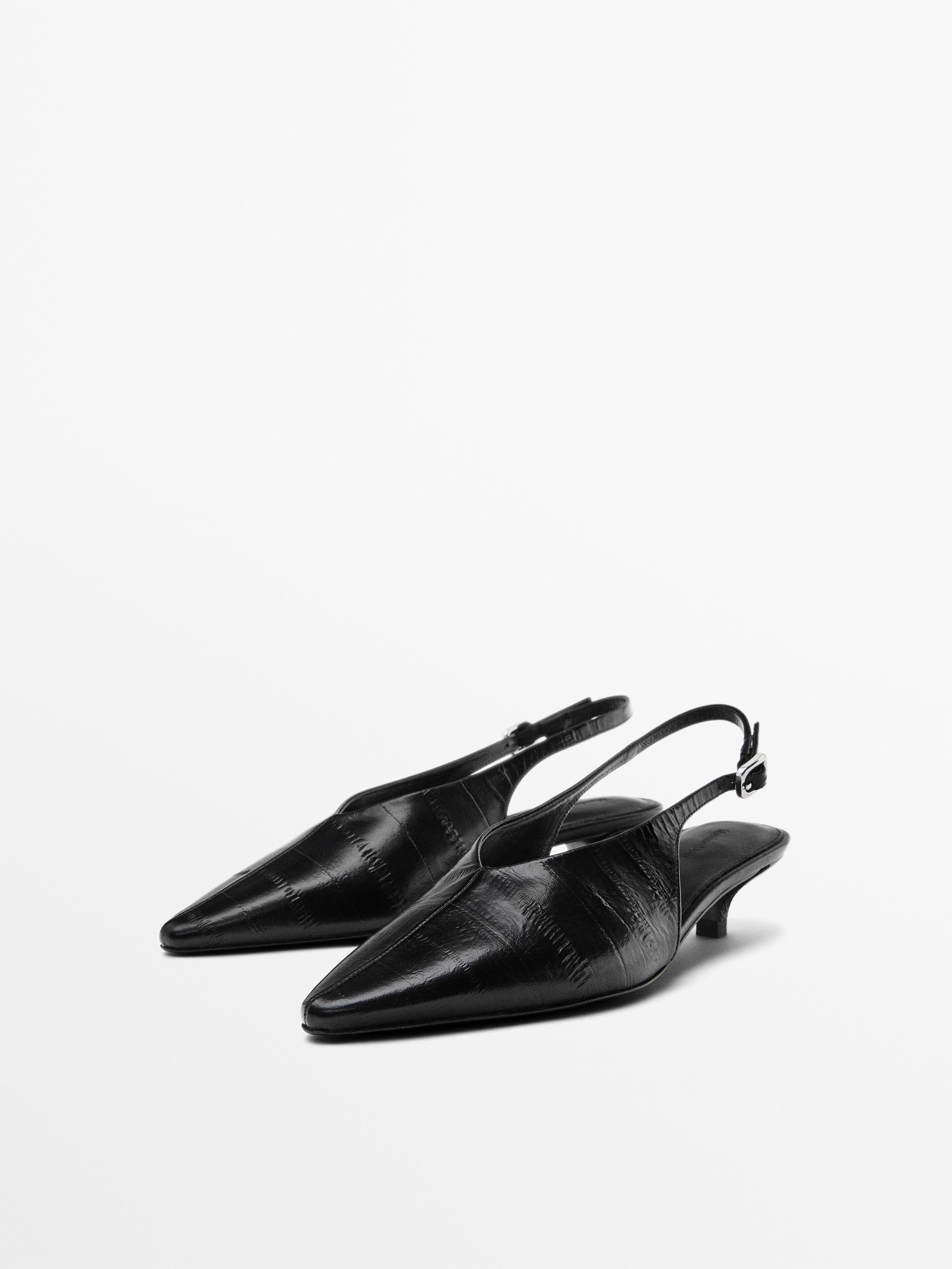 Sepatu mule hak tinggi