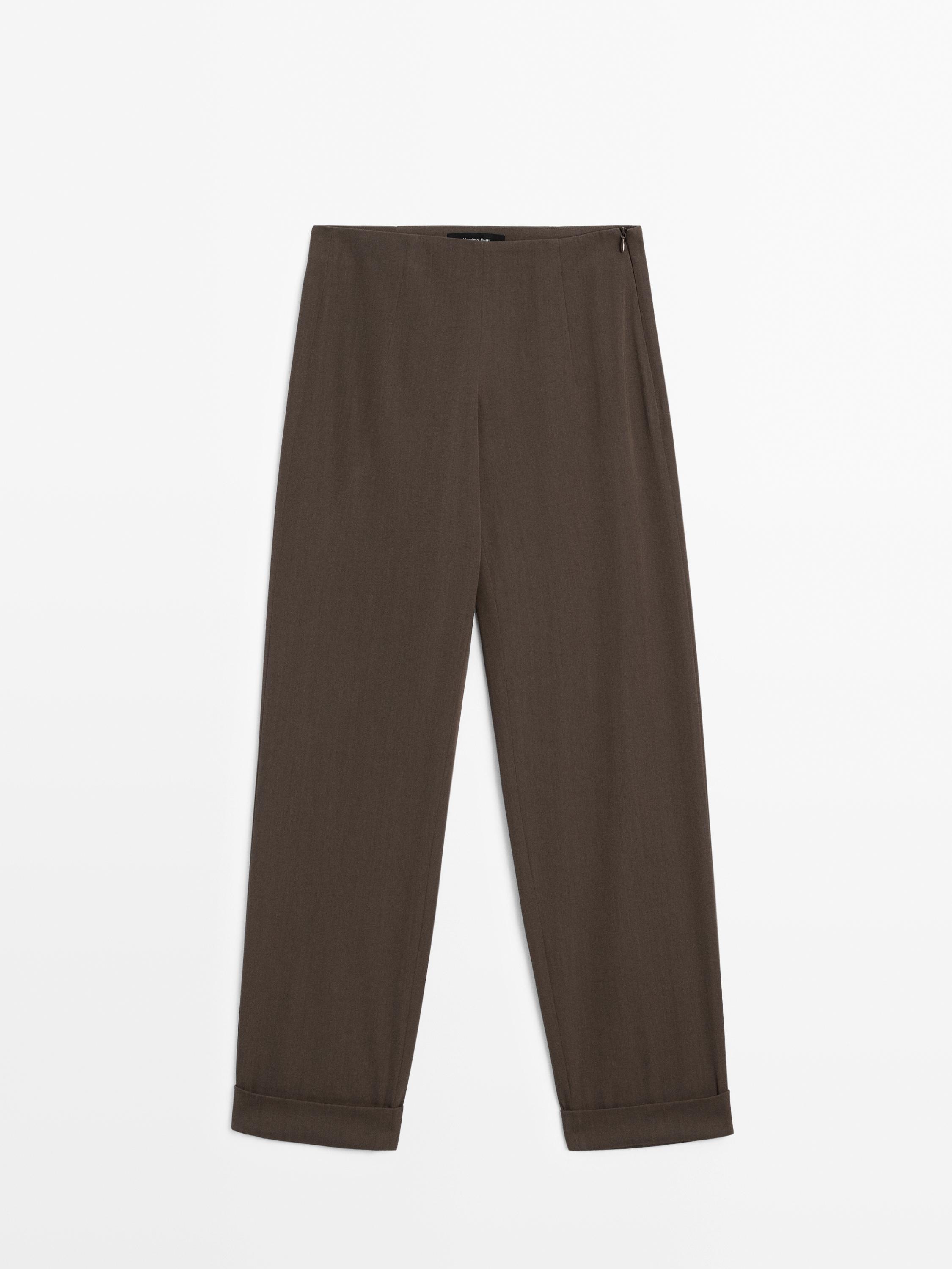 Suit trousers with turn-up hems