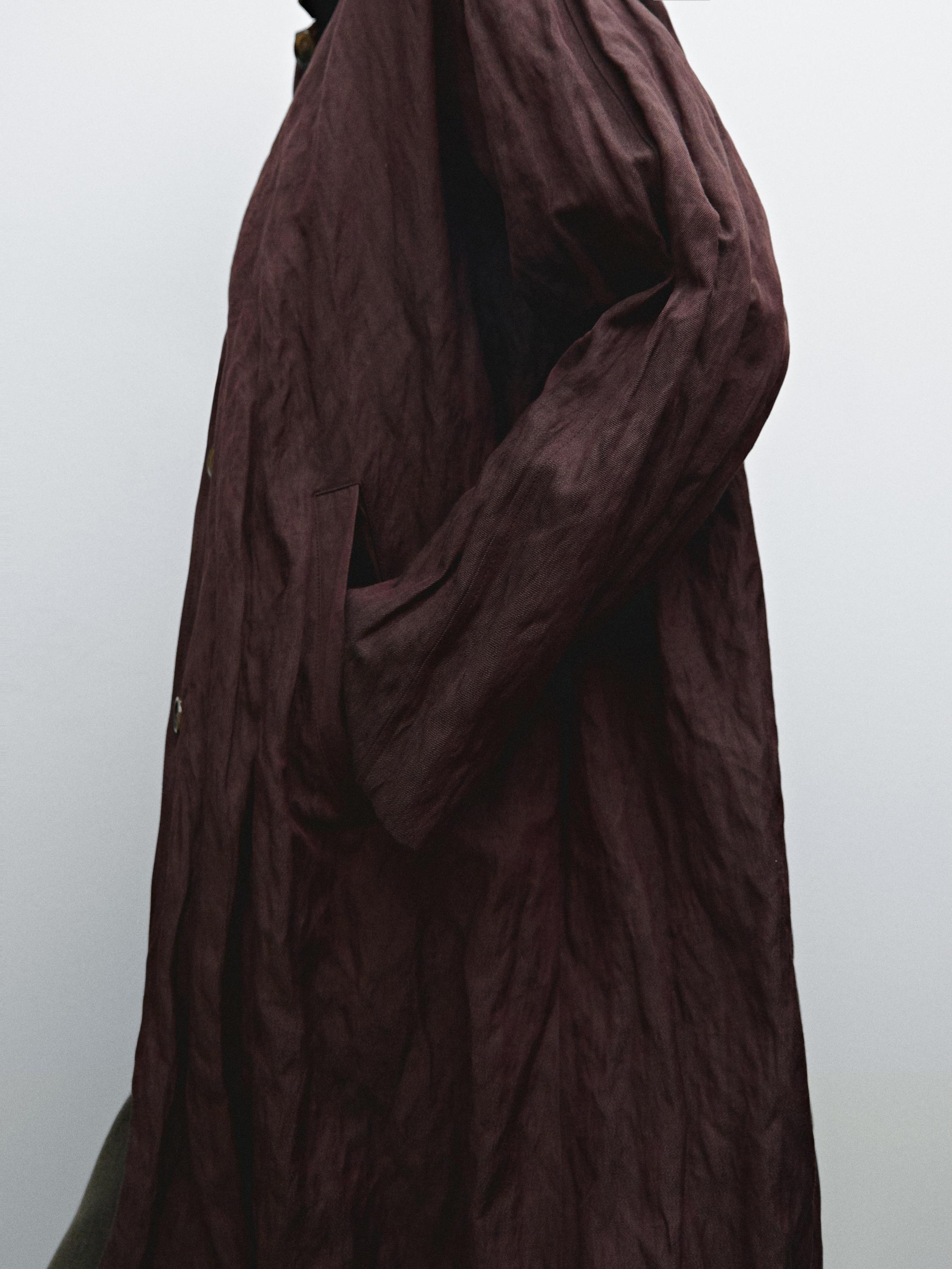 Burgundy trench coat in crinkle fabric