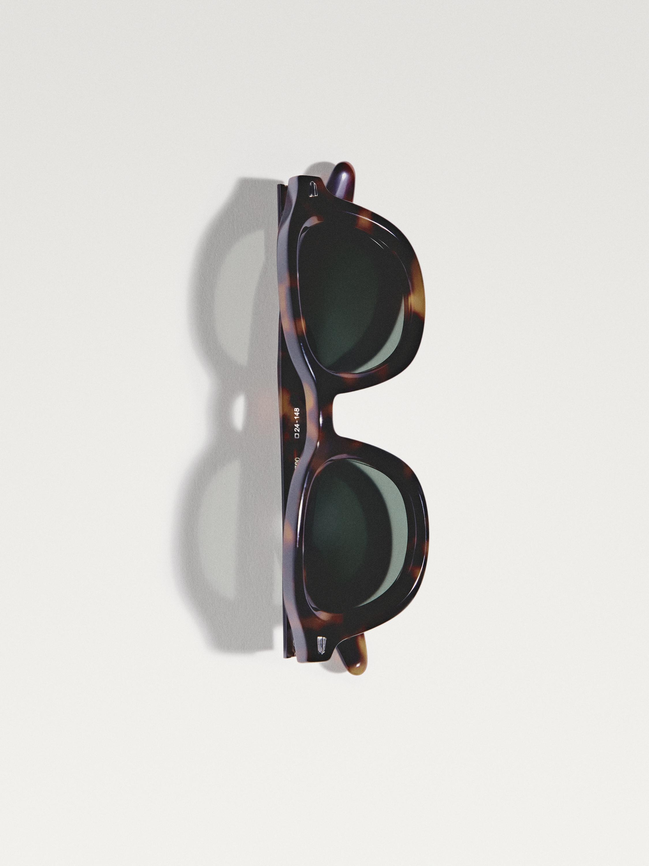 Round tortoiseshell-effect sunglasses