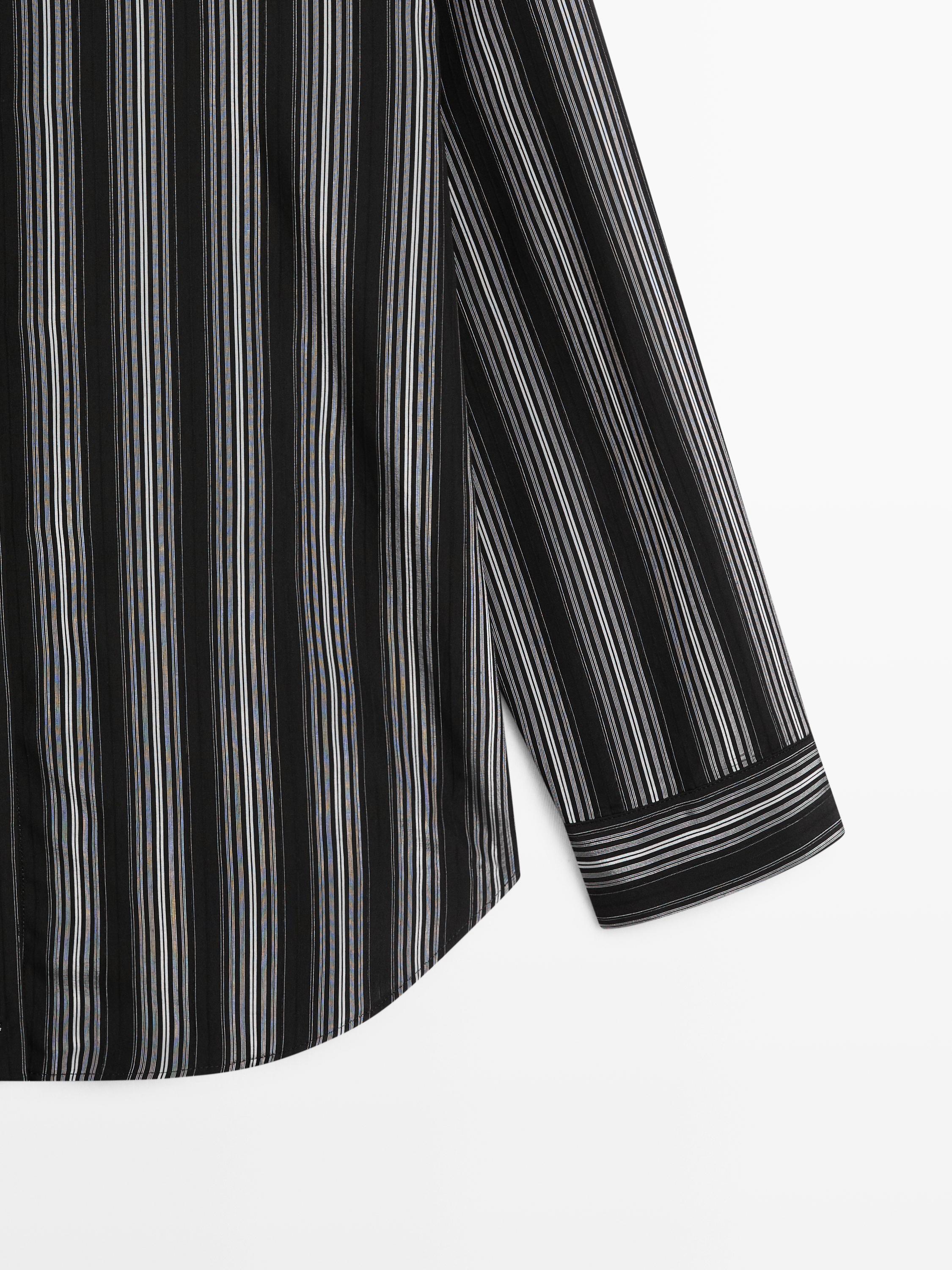 Flowing shirt with striped detailing