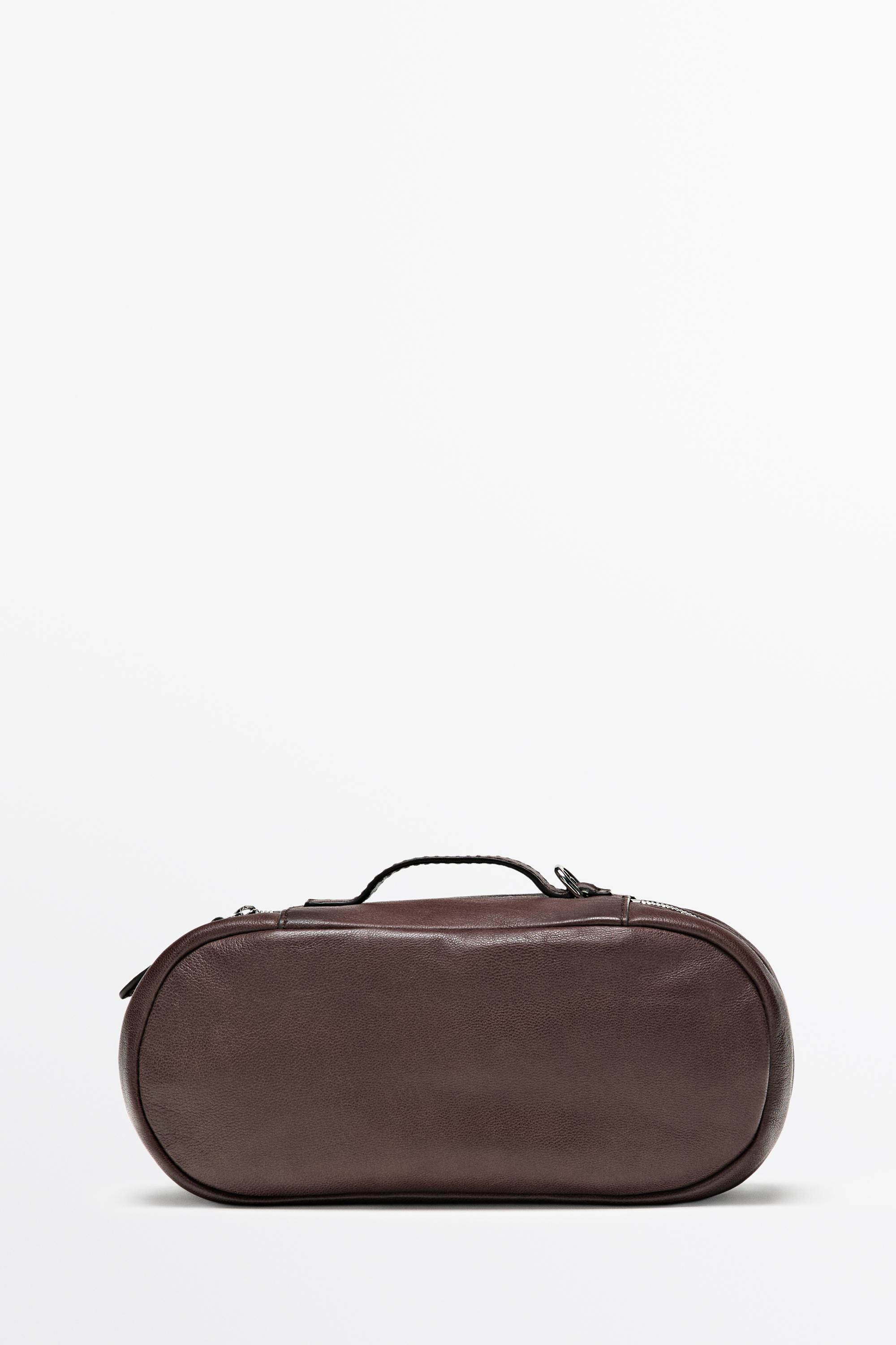 Oval nappa leather toiletry bag — BROWN