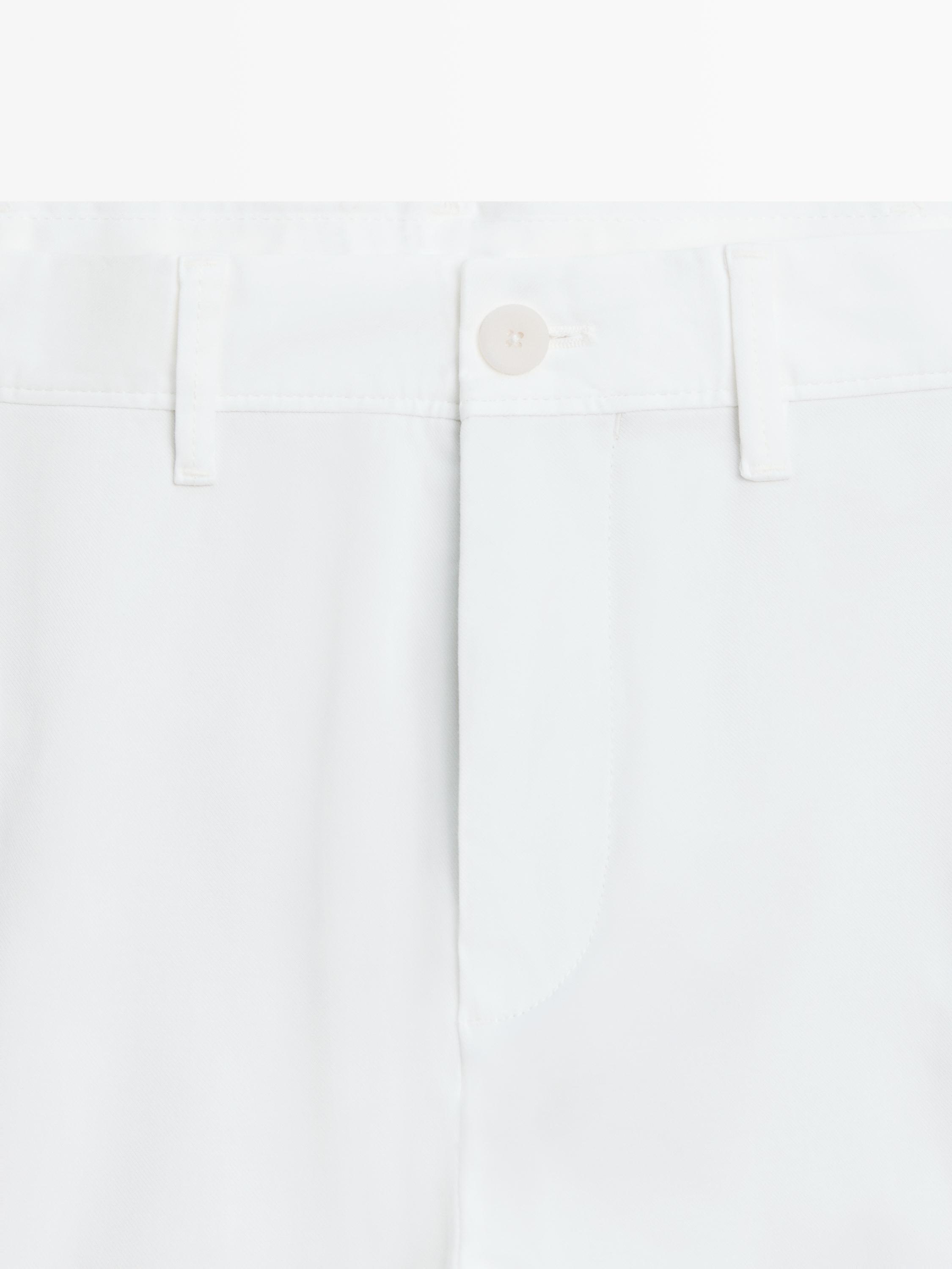 Cotton blend slim fit pants — Off white