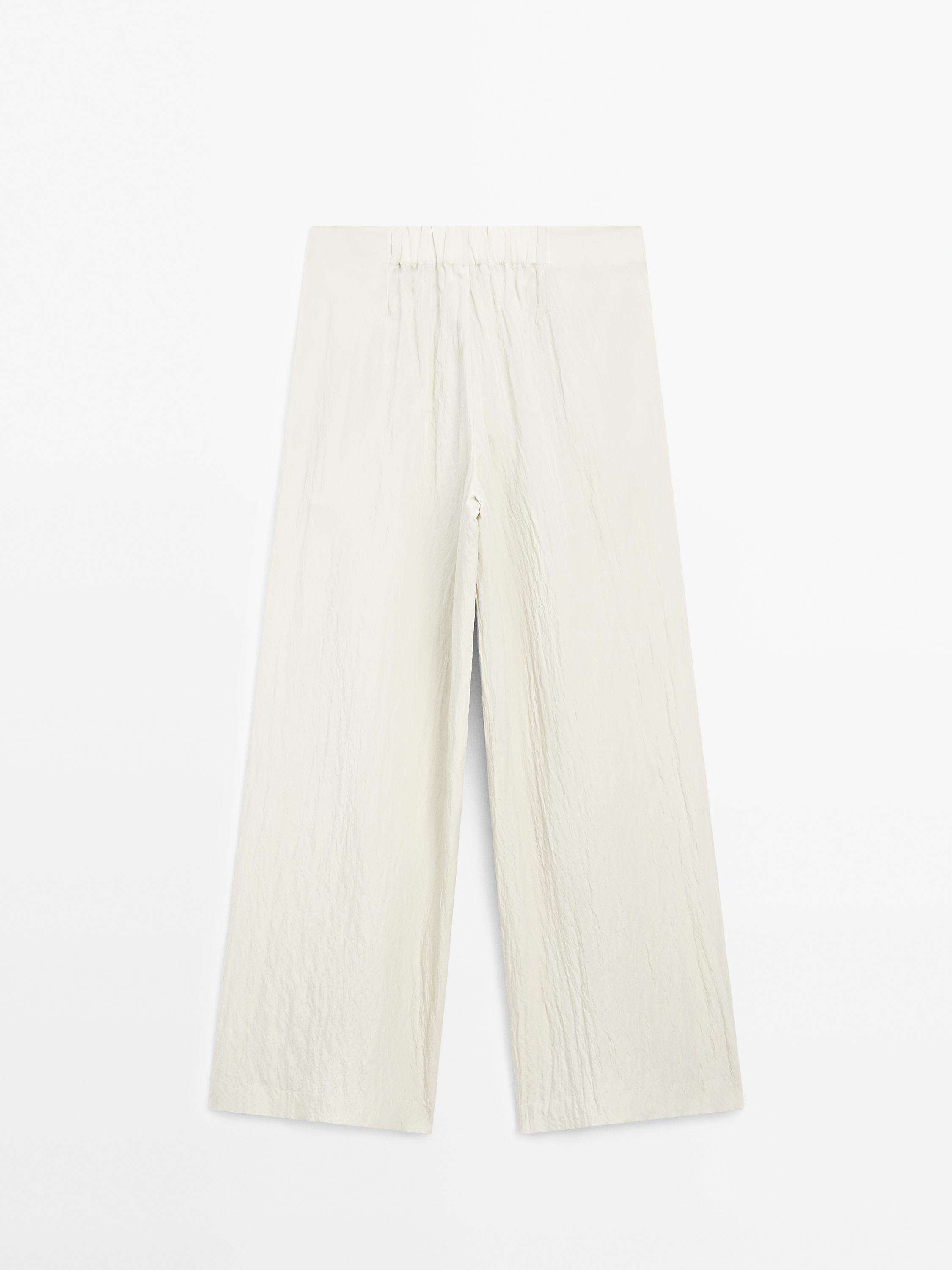 Technical trousers with darts