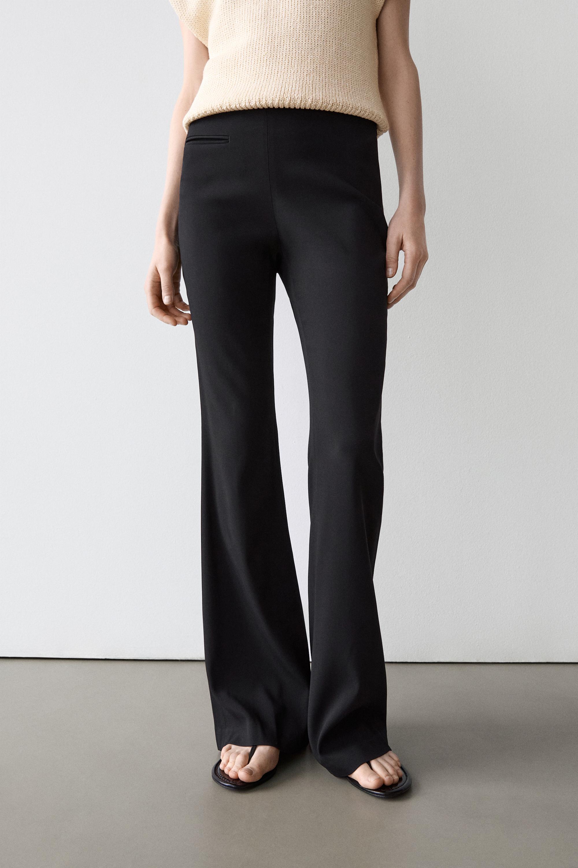 Flared trousers with pocket — BLACK