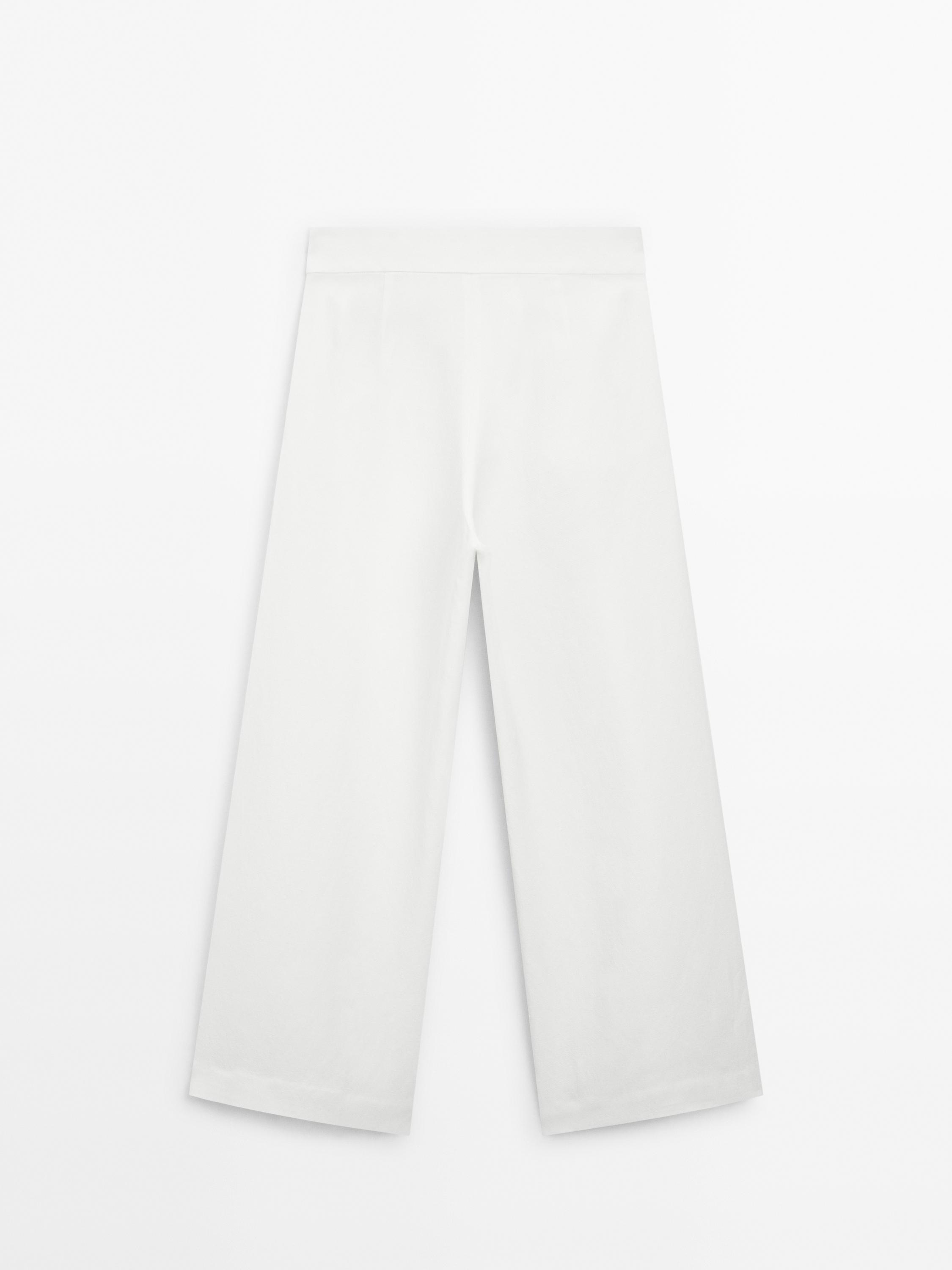 Flowing pleated palazzo trousers