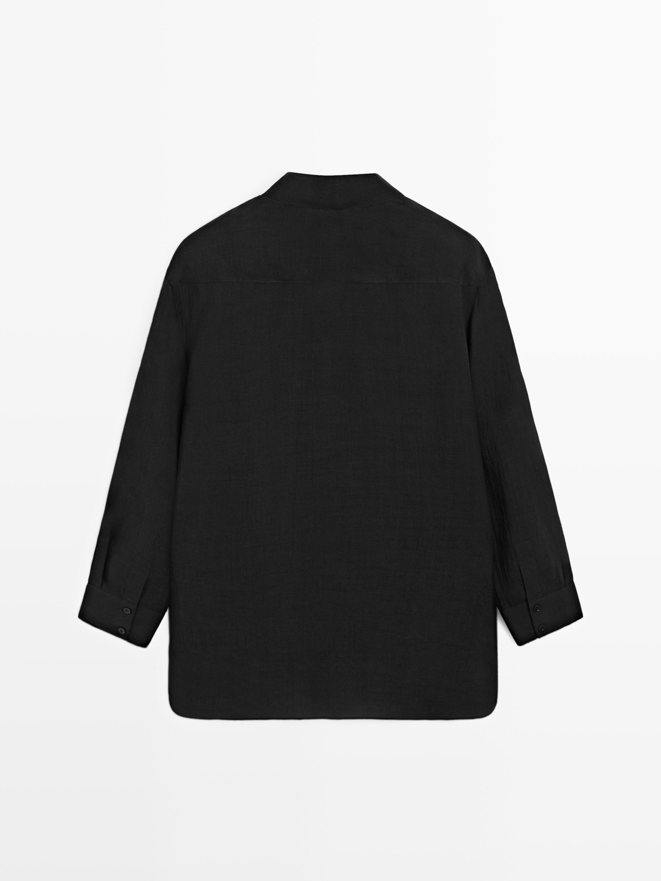 Chemisier fluide semi-transparent détail plastron