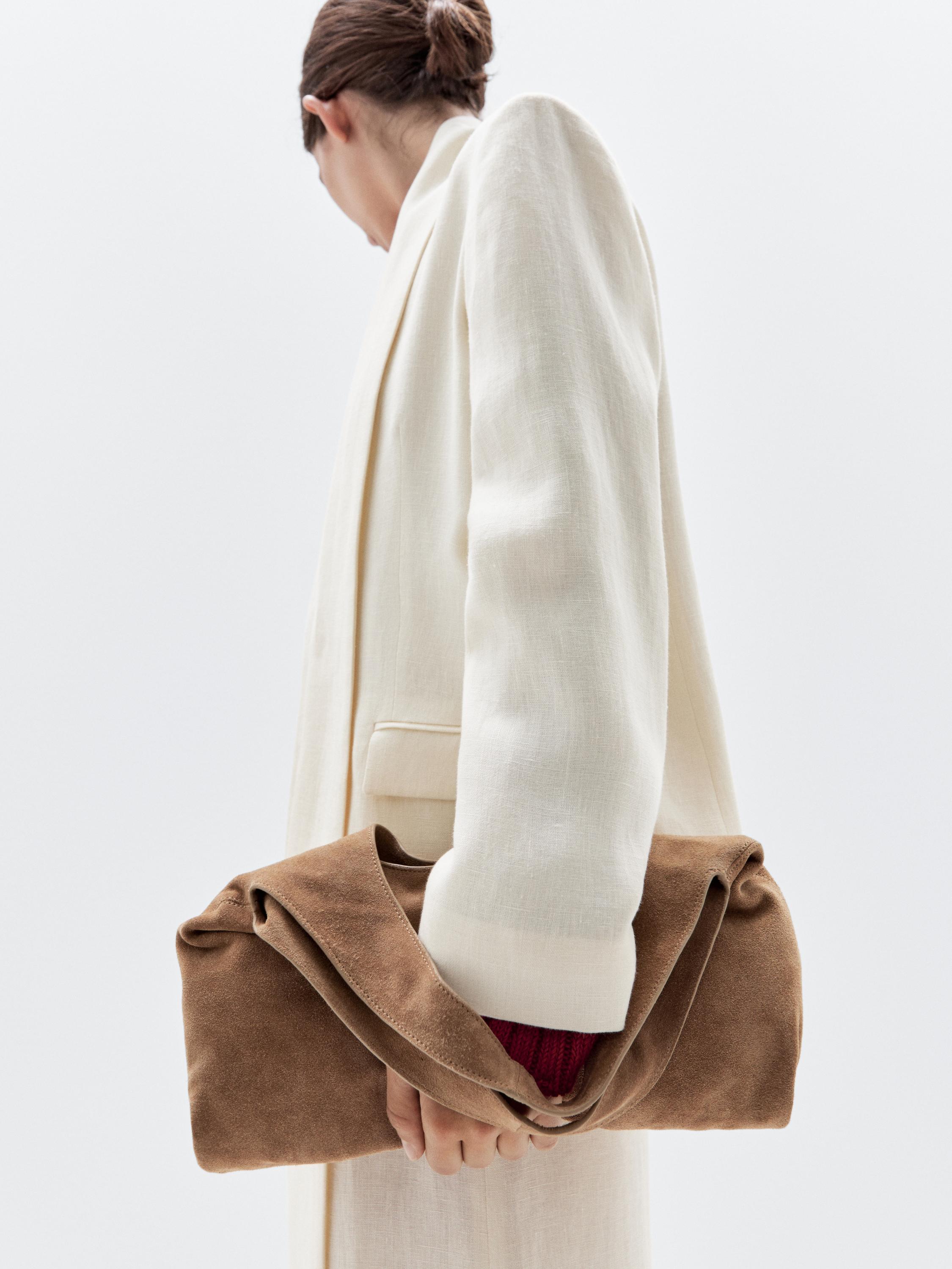 Vidēja izmēra sieviešu soma ar raupjas zamšādas apdari