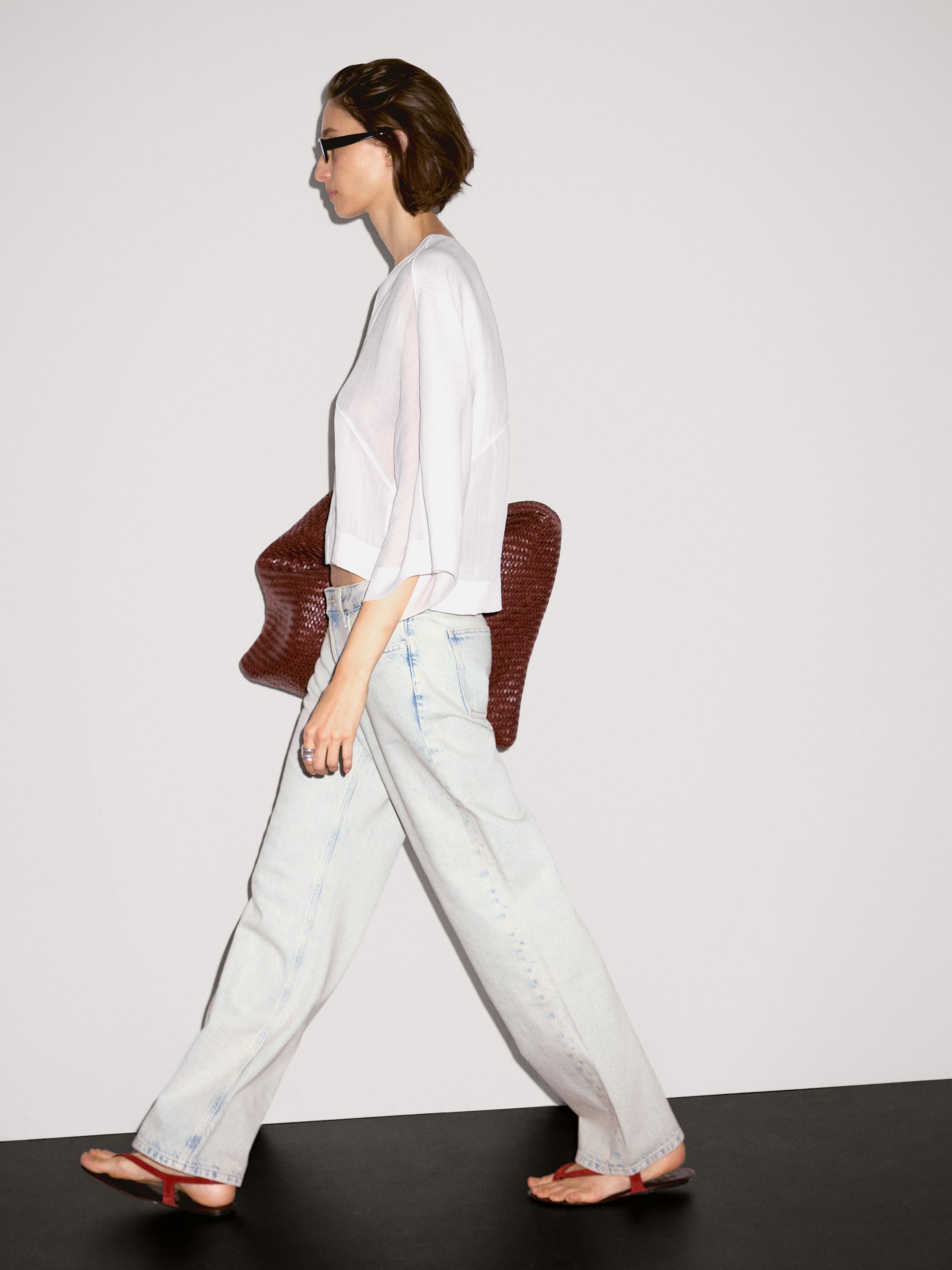 Flowing linen blend blouse with seam details