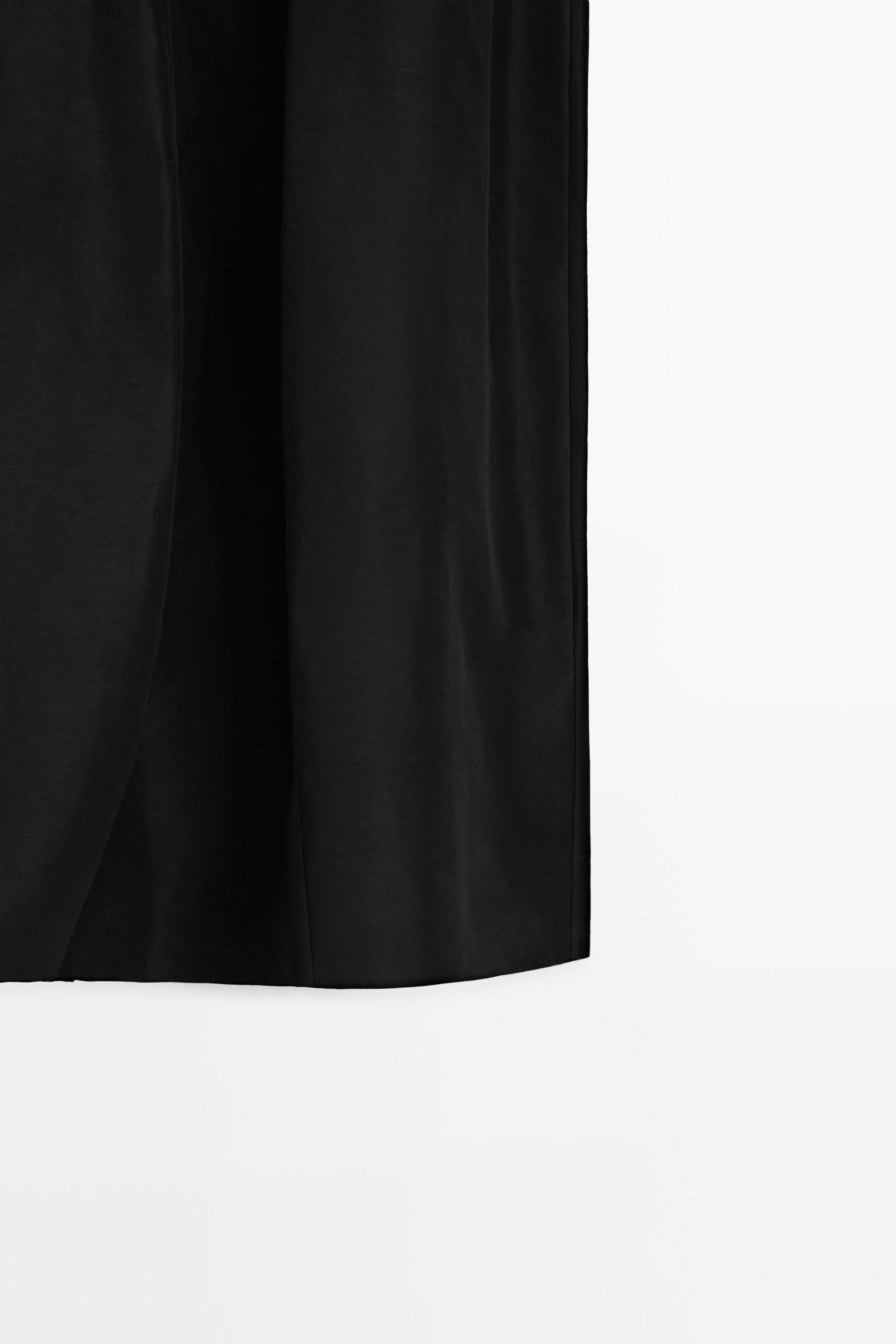 Flowing Seamed Midi Skirt - STUDIO — BLACK