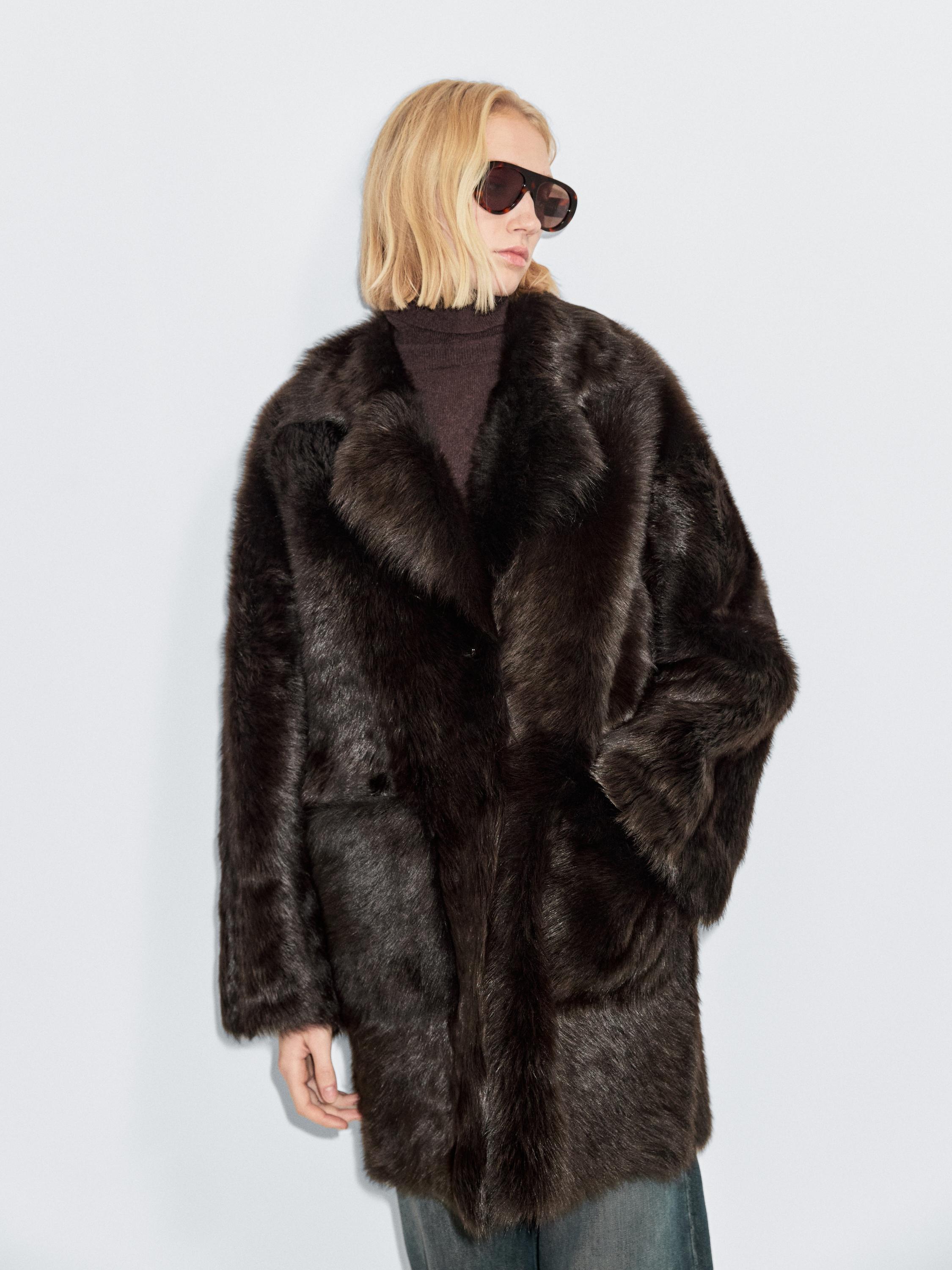 Lange schapenleren jas