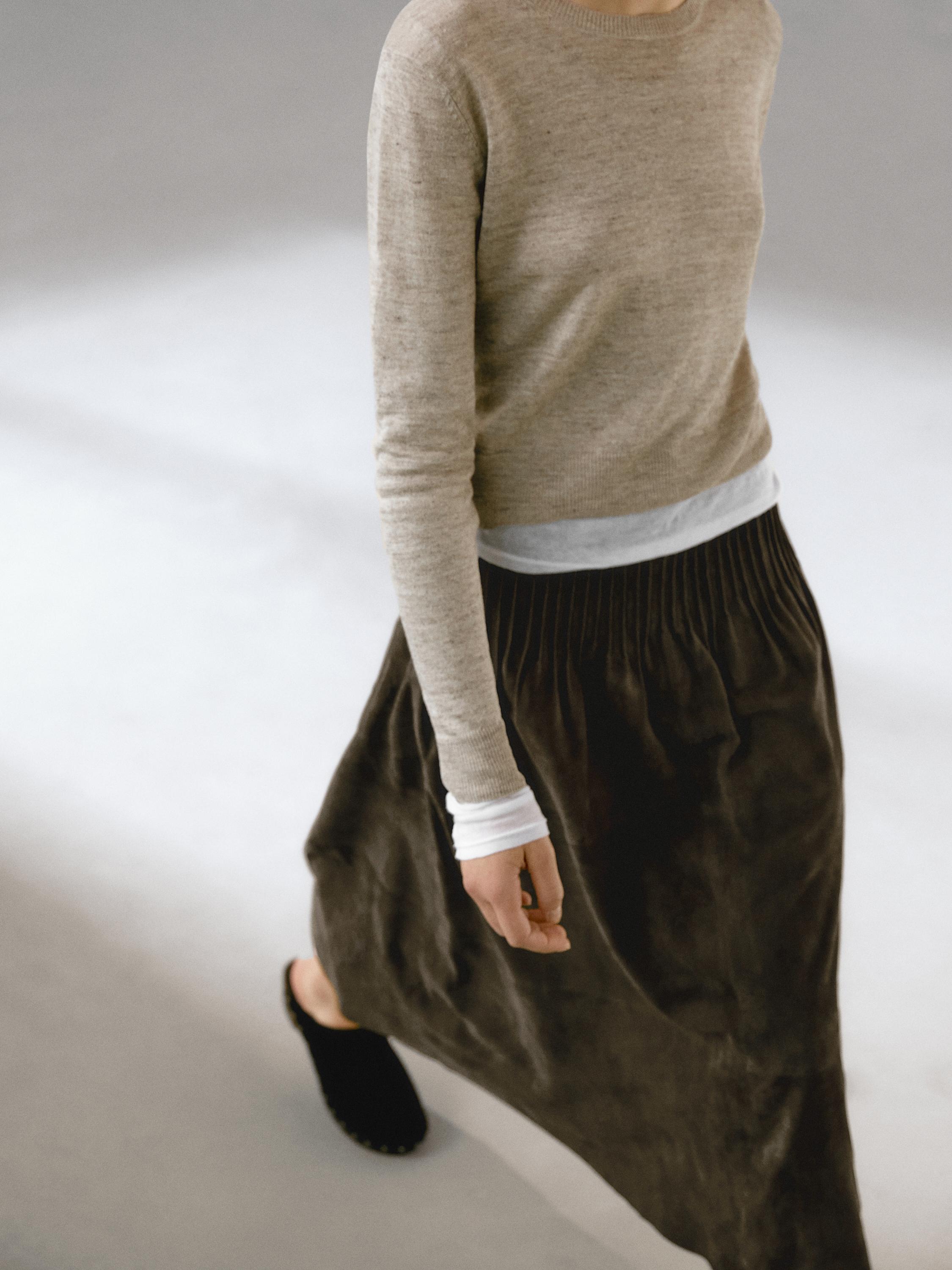 Suede leather midi skirt with topstitching