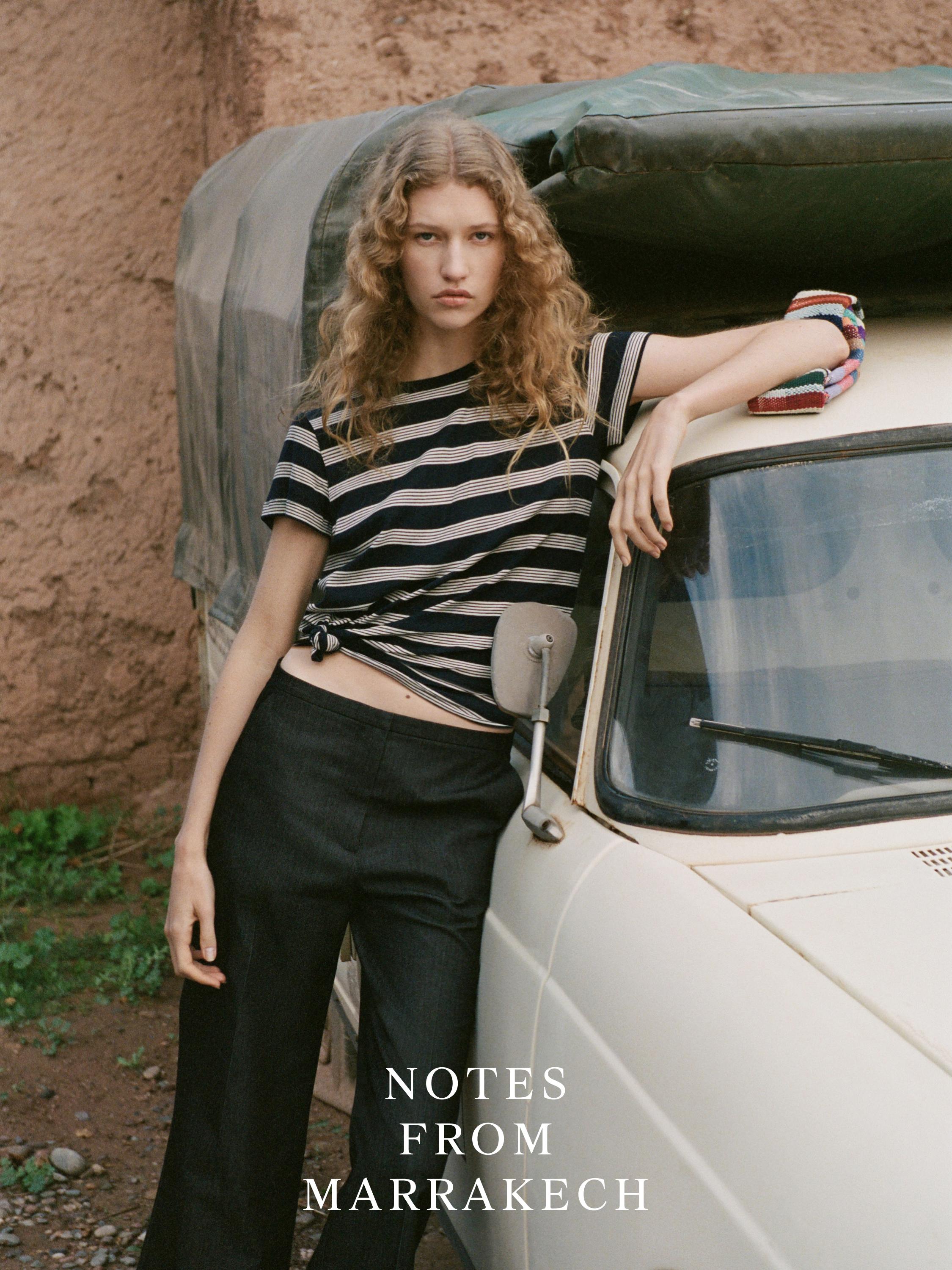 Denim-effect flared trousers — BLACK