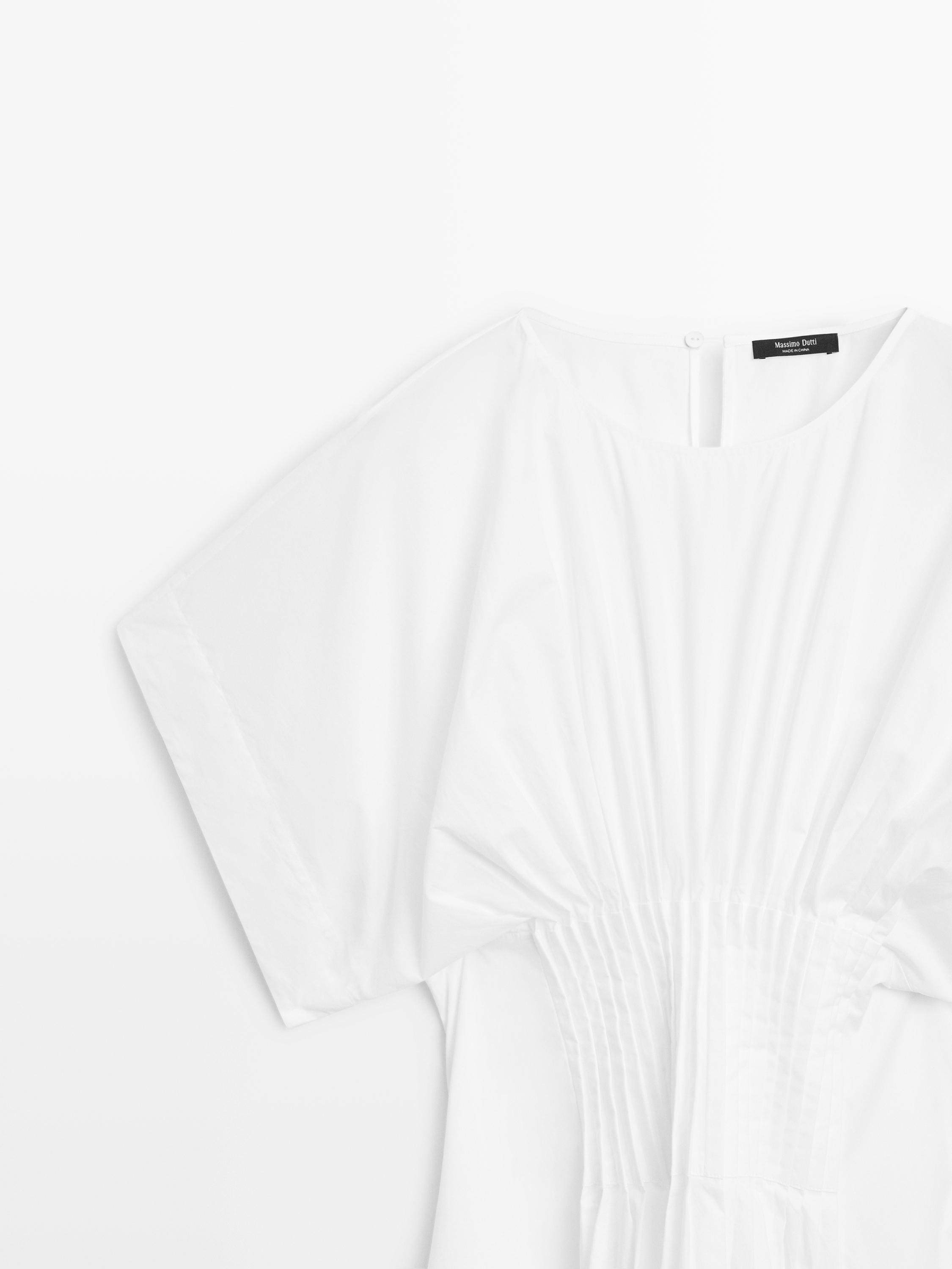 Robe longue plissée