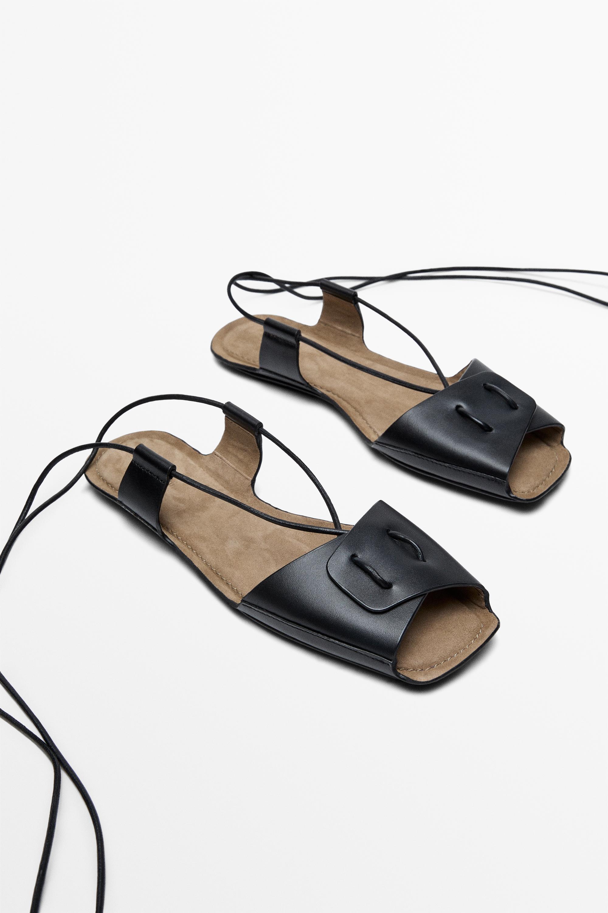 Flat leather strappy sandals
