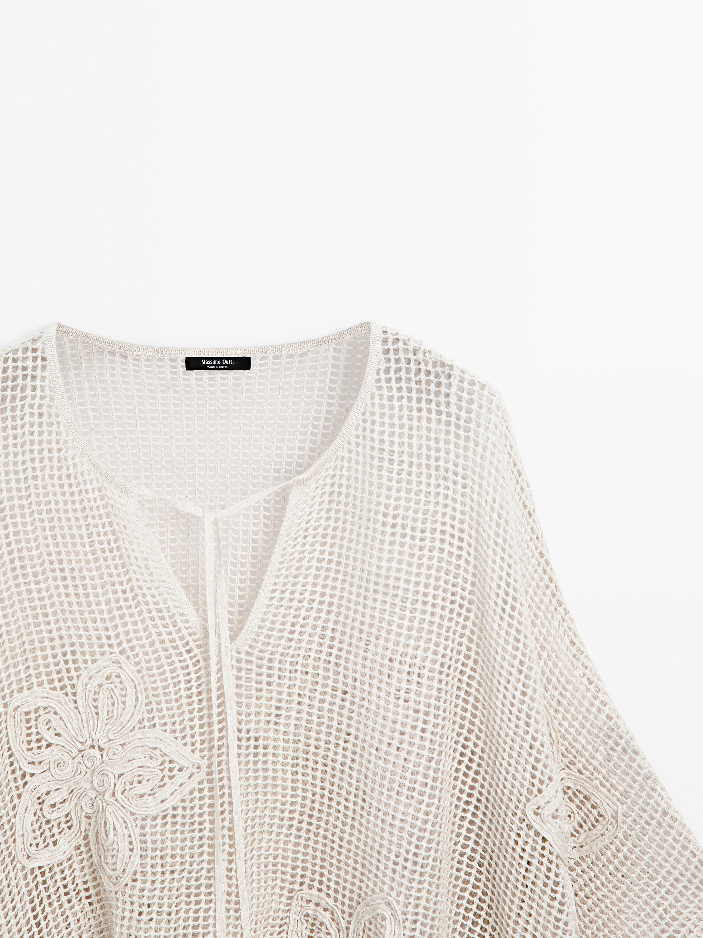 Embroidered cutwork cape