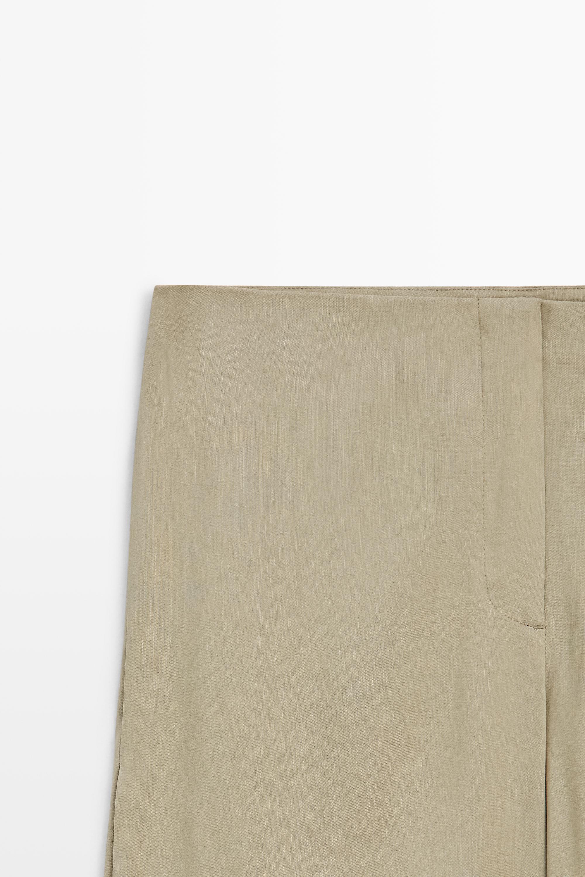 Flowing pleated pants - STUDIO — PALE KHAKI