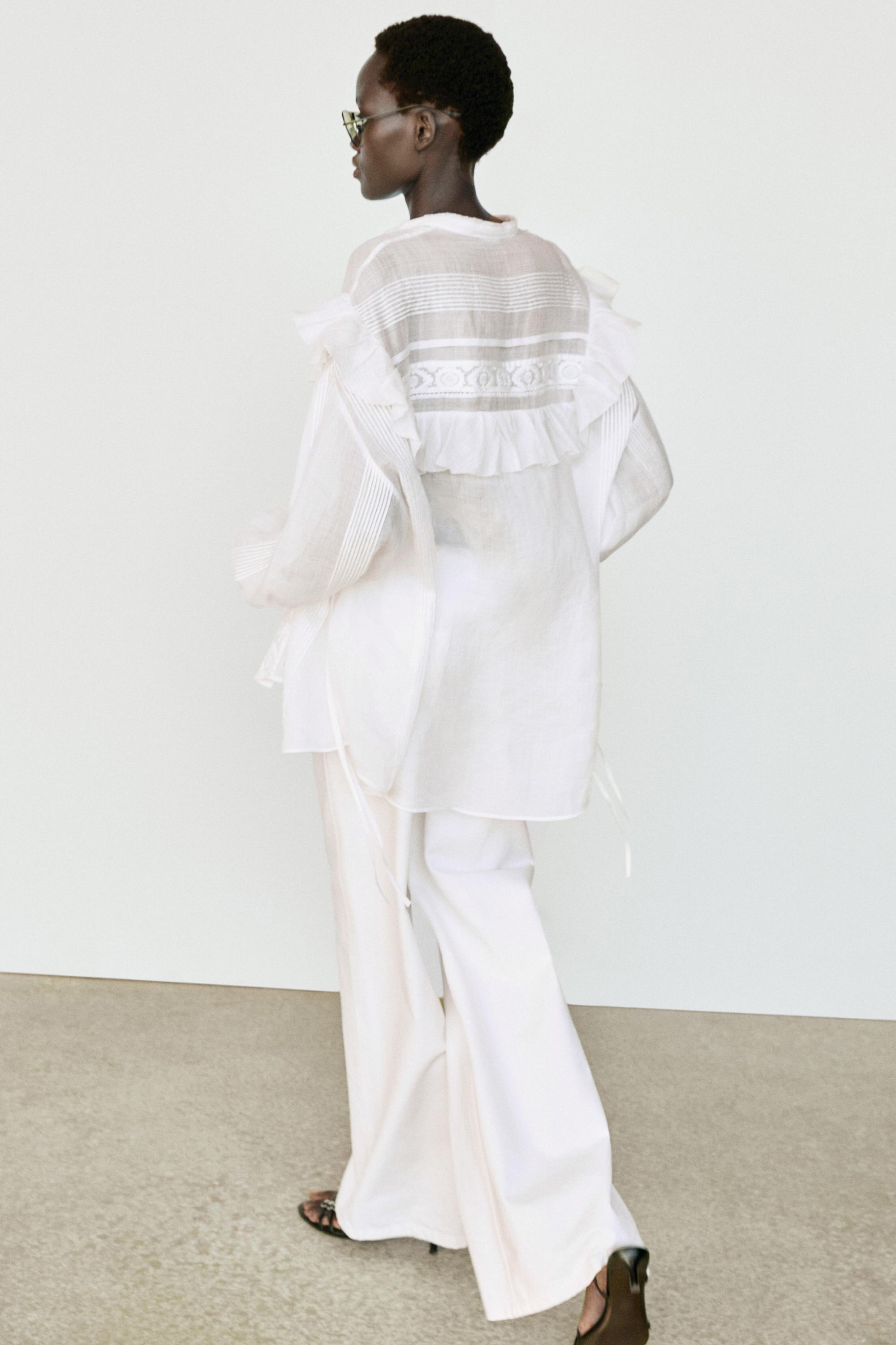 Stand collar blouse with embroidery and ruffles — WHITE