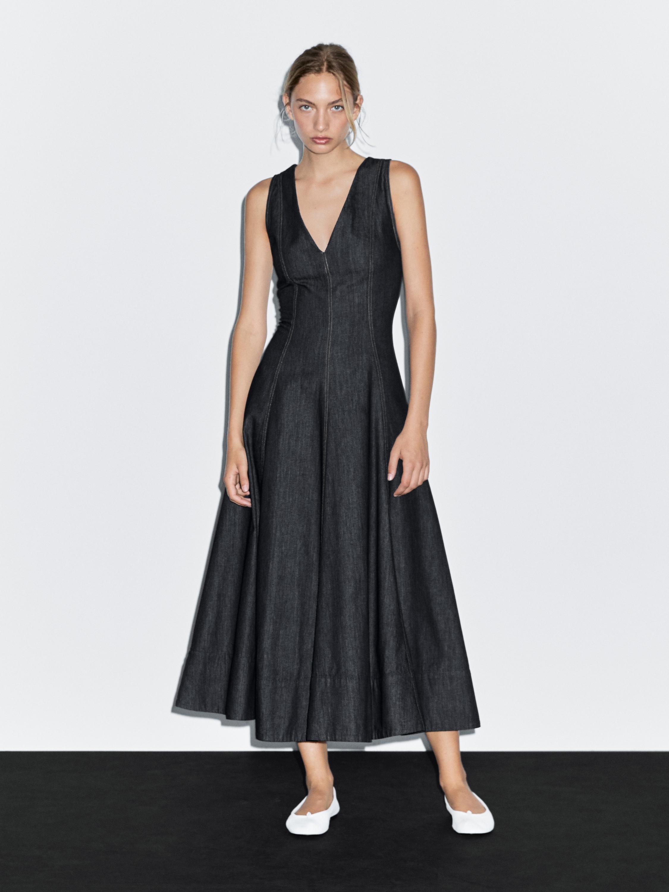 فستان ميدي دنيم بتفاصيل بالغرزة